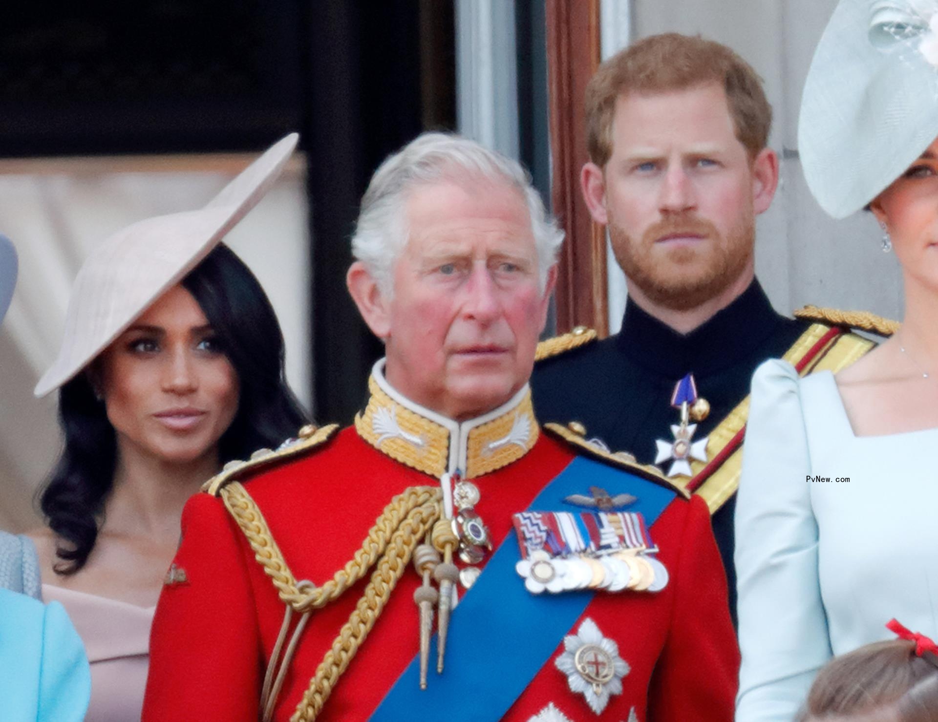 Prince Harry, Meghan Markle and King Charles III on the balcony of Buckingham Palace in 2018.