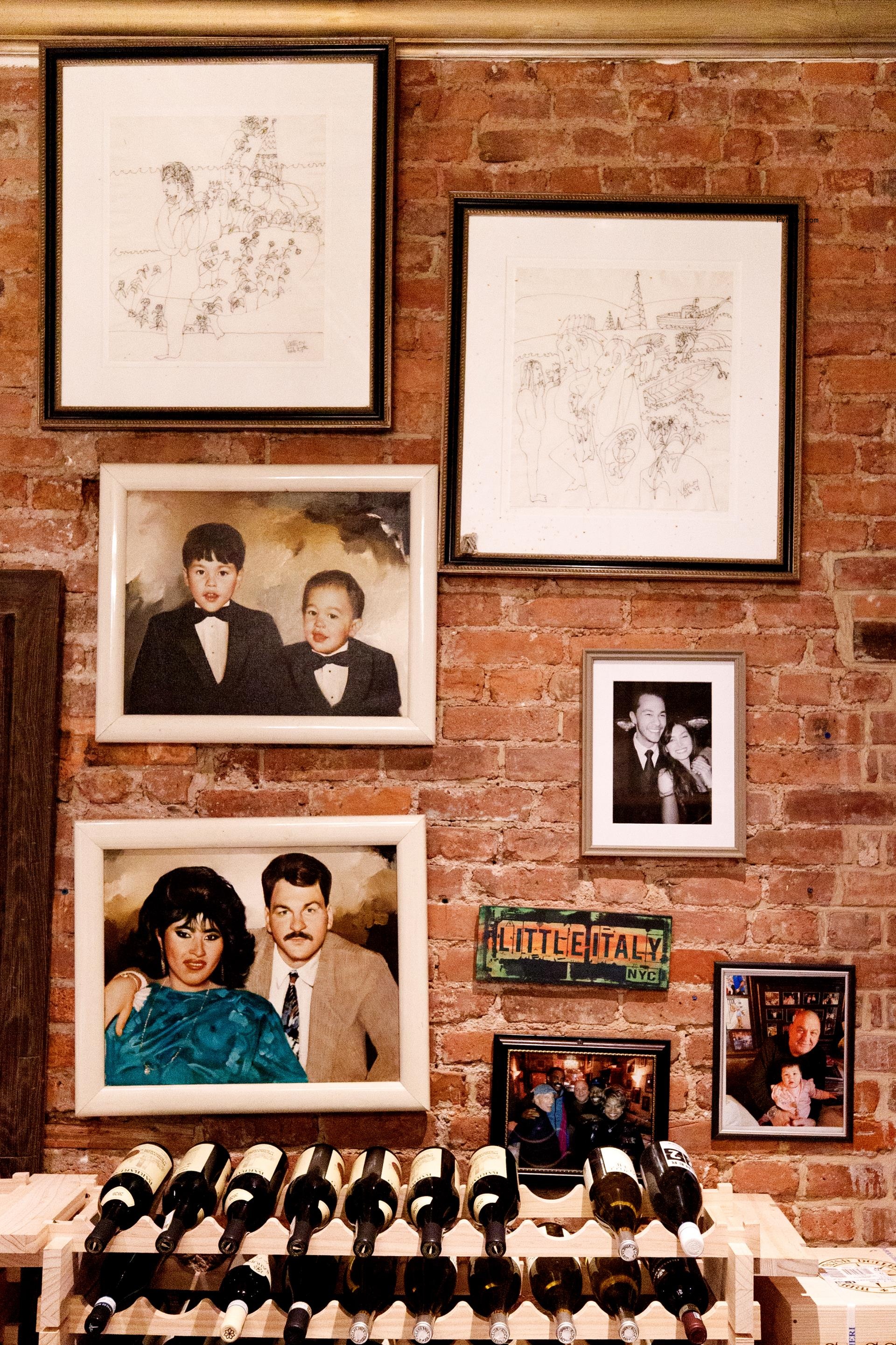 f<i></i>ramed photos of the Vitolo family in the back room of Emilio's Ballato