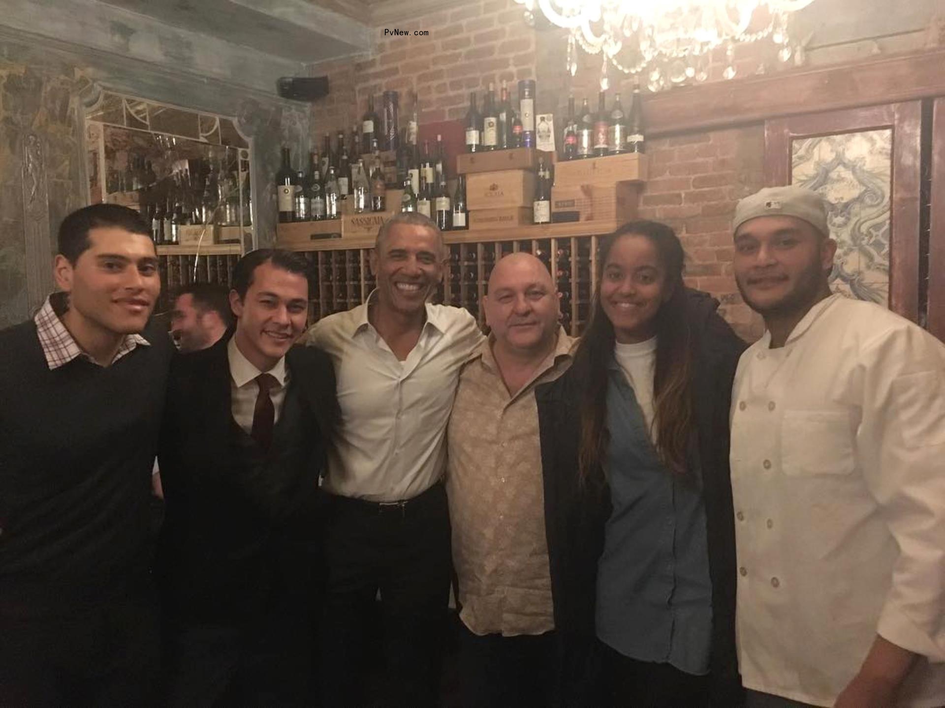 Barack Obama and Malia Obama in the back room of Emilio's Ballato with Emilio Vitolo, Anthony Vitolo, Emilio Vitolo Jr. and Mario Vitolo