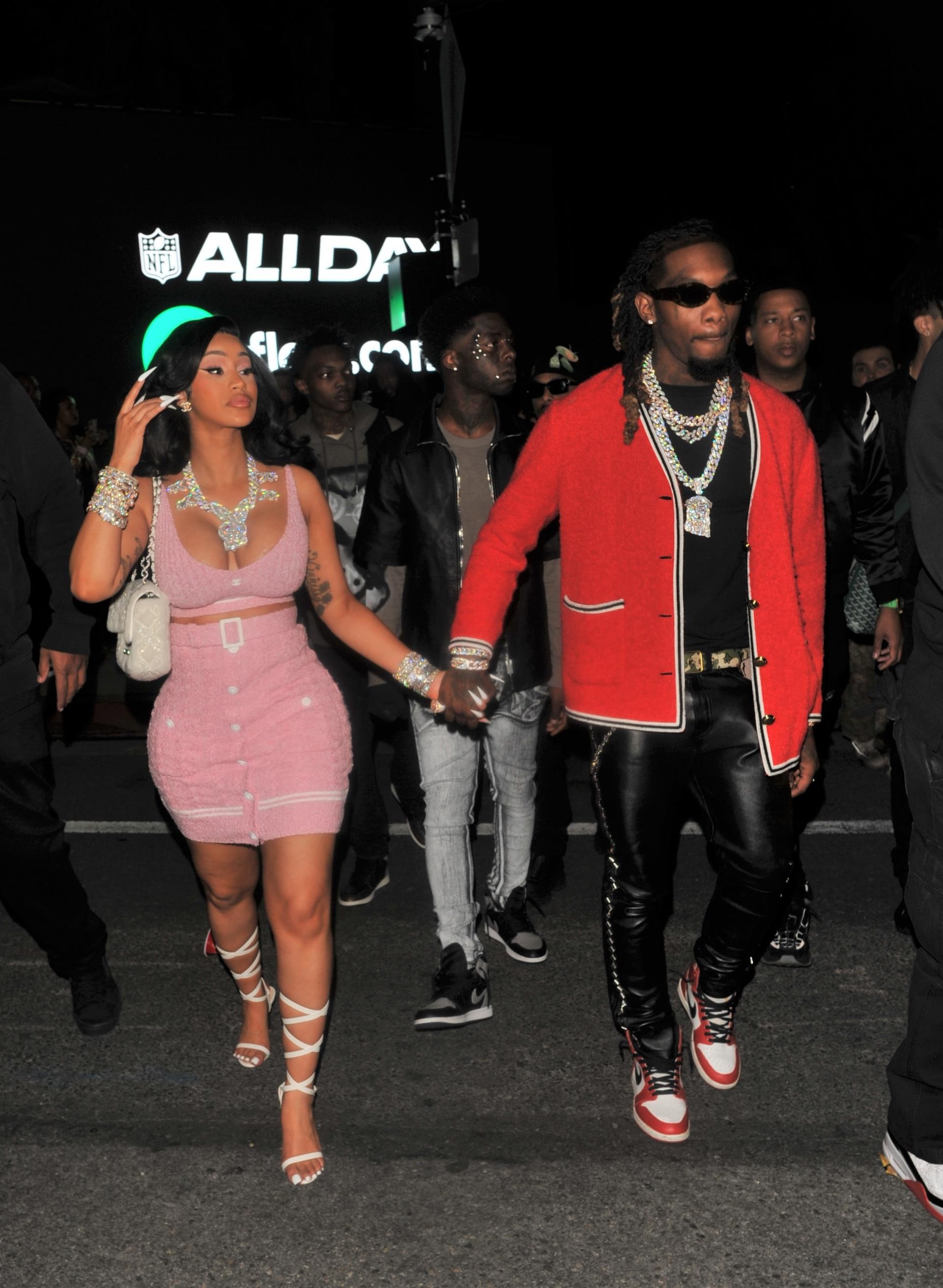 Cardi B nad Offset holding hands in 2022.