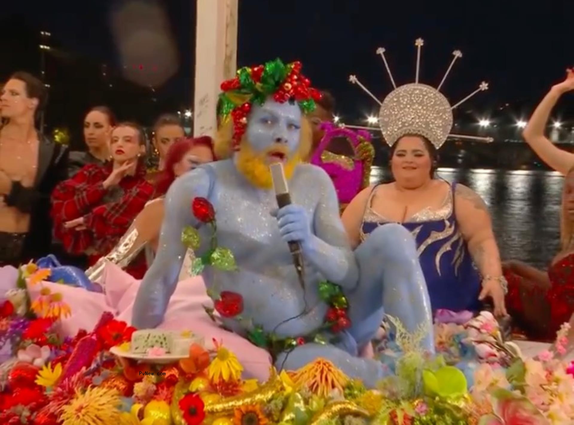 Philippe Katerine performing in drag in a last supper homage during olympics opening ceremony