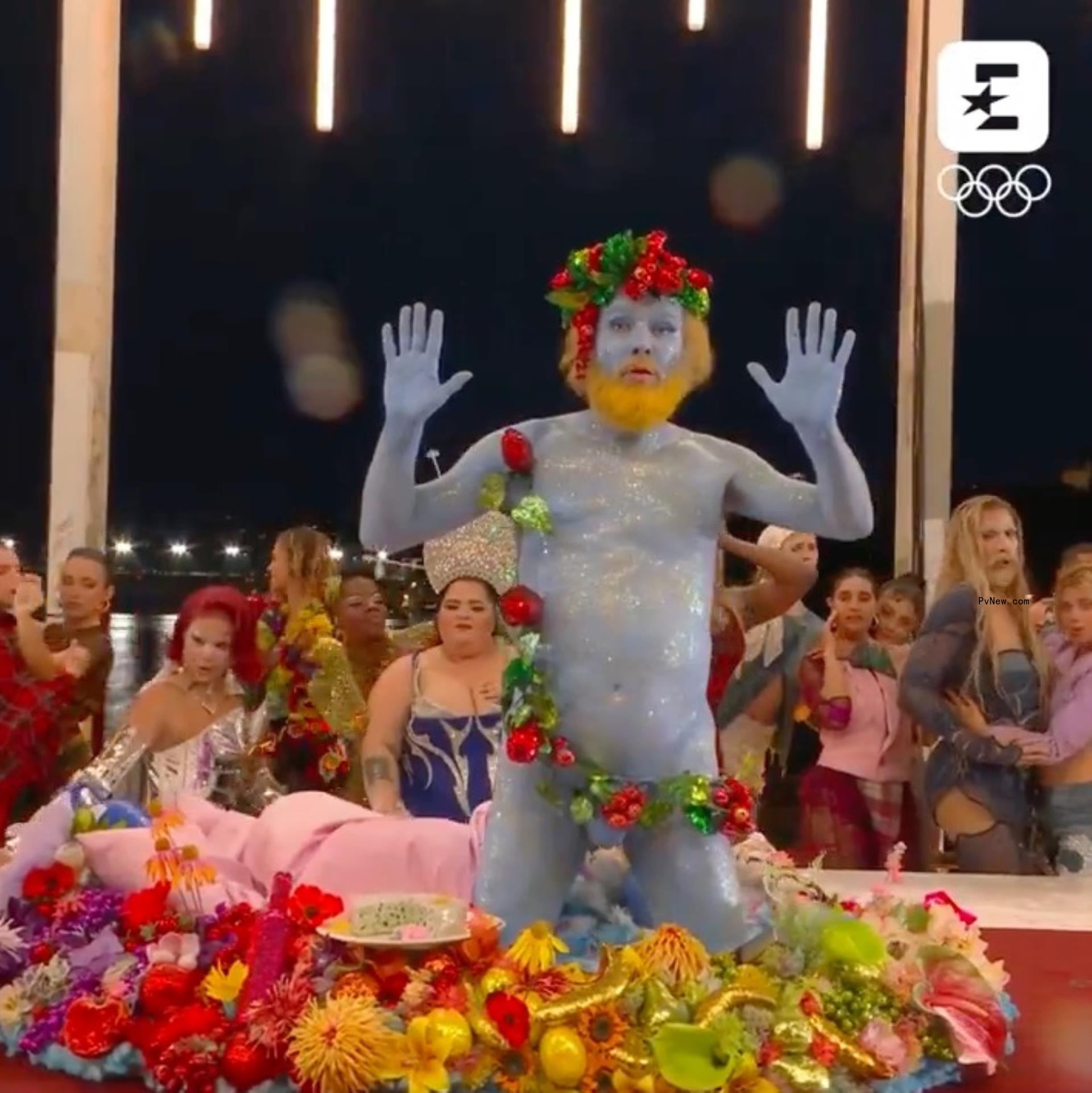Philippe Katerine performs in drag on a table during the opening ceremony of the 2024 Olympics in Paris.