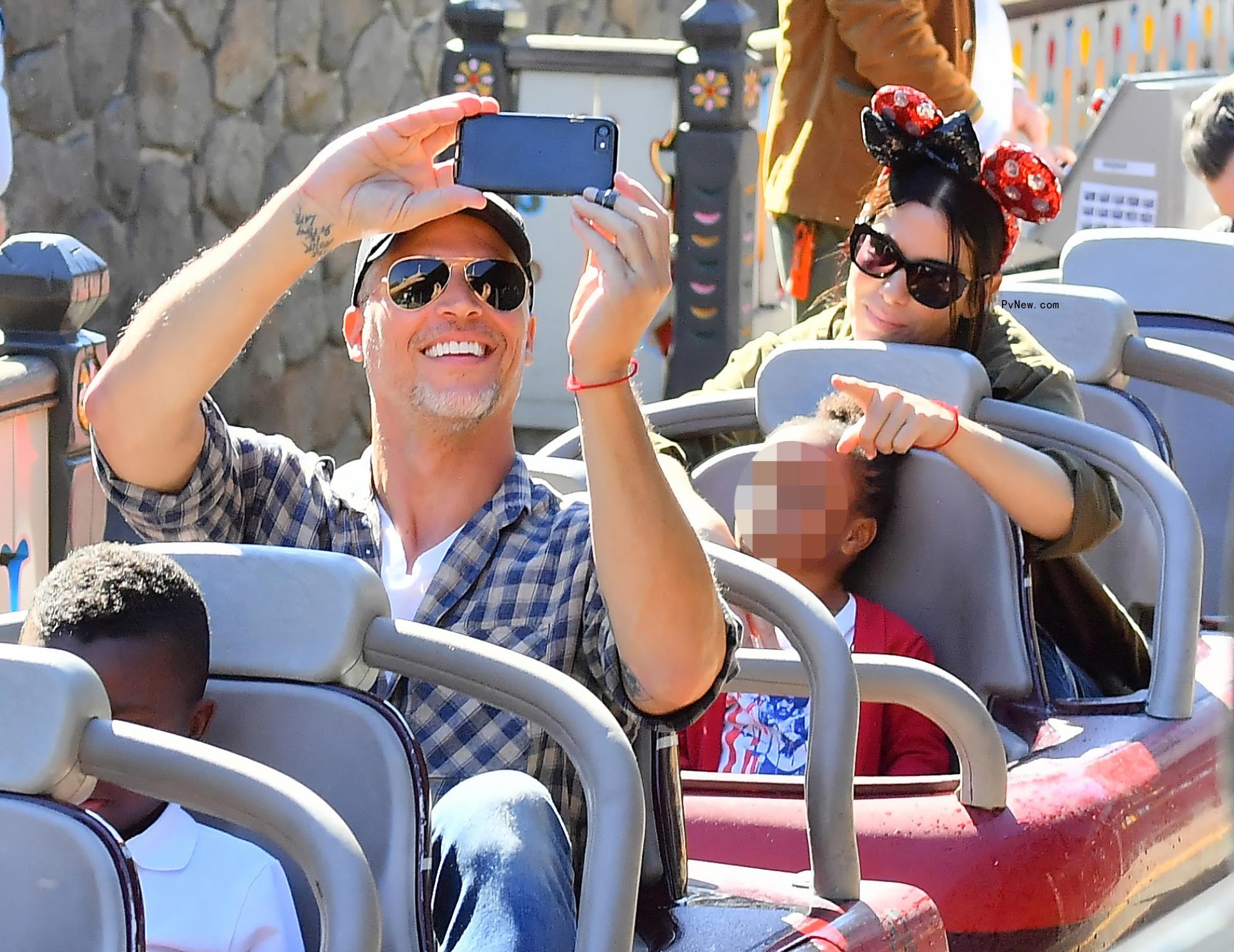 Sandra Bullock, Bryan Randall and her kids.