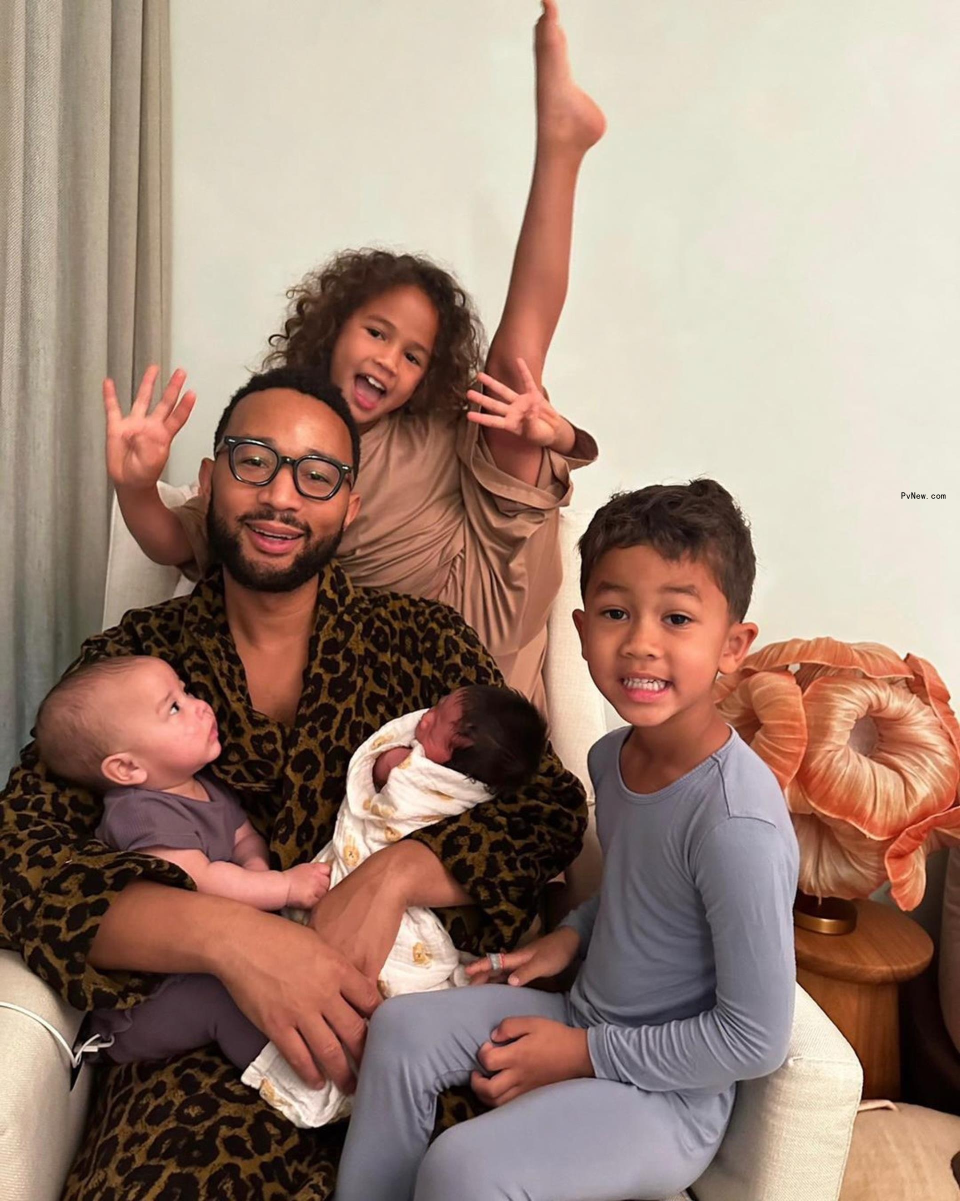 John Legend and his four kids.