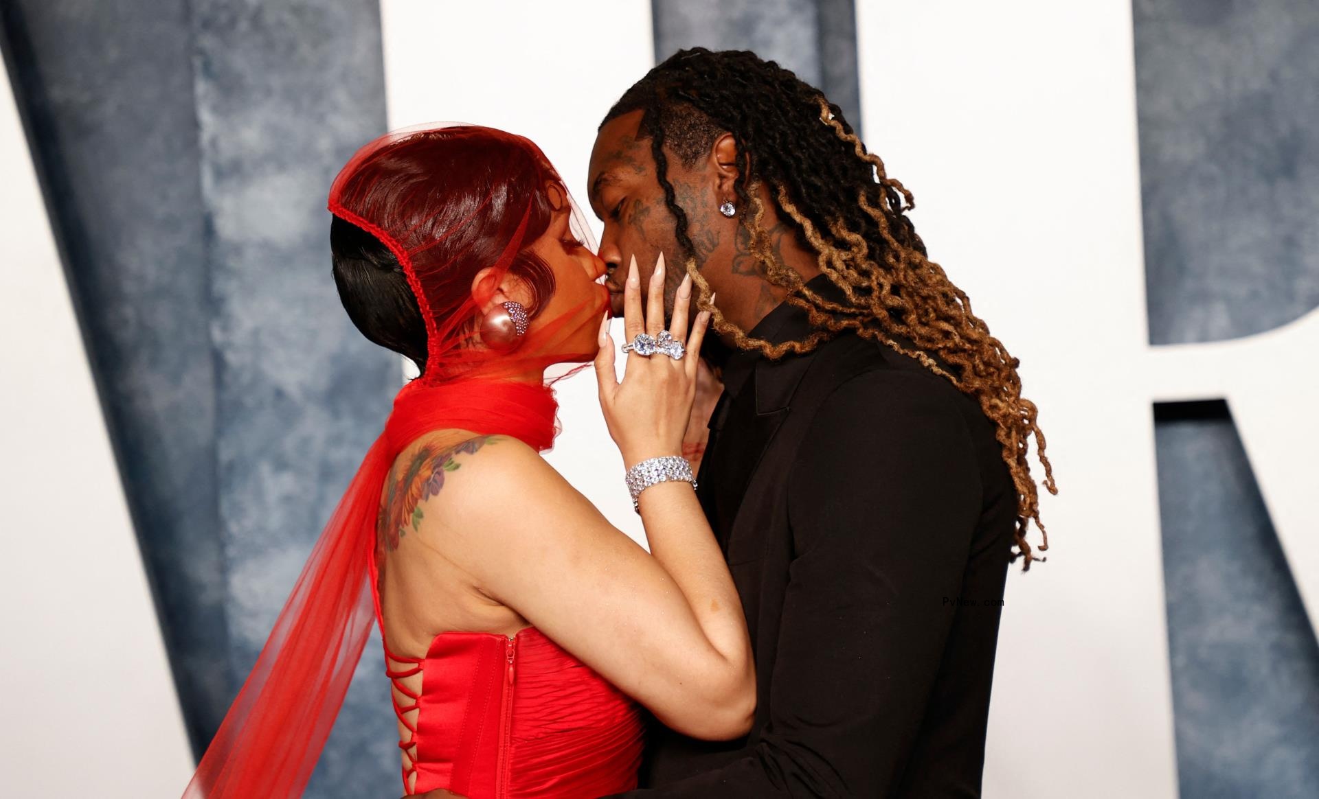 Cardi B and Offset kiss at 2023 Vanity Fair Oscars Party