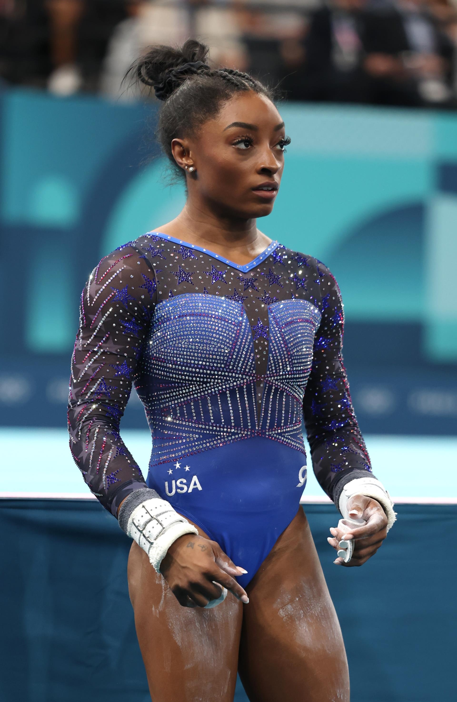 Simone Biles of Team United States prepares to compete on the uneven bars during the Artistic Gymnastics Women's All-Around Final on day six of the Olympic Games Paris 2024.