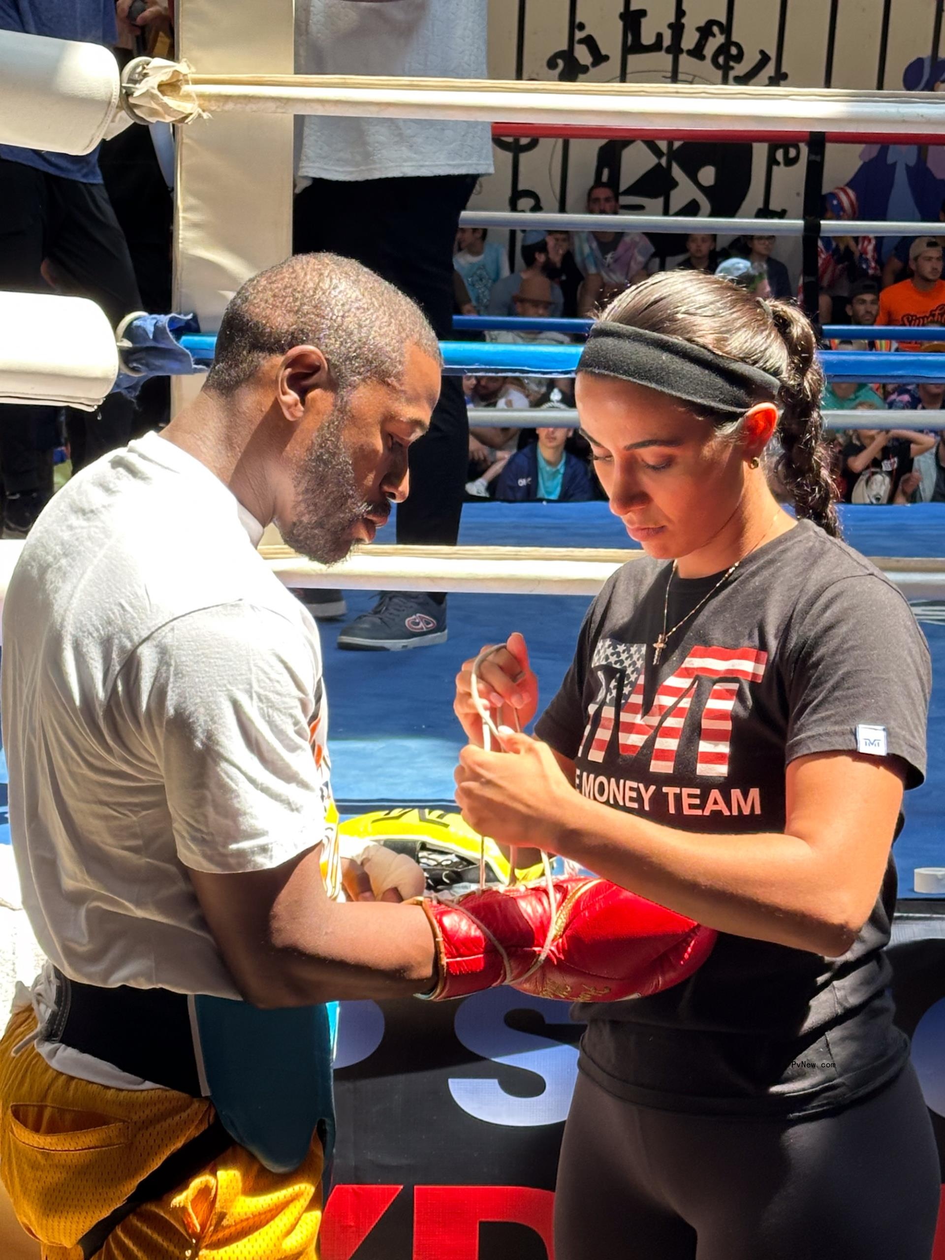 floyd mayweather havin<i></i>g his hands wrapped by a camper