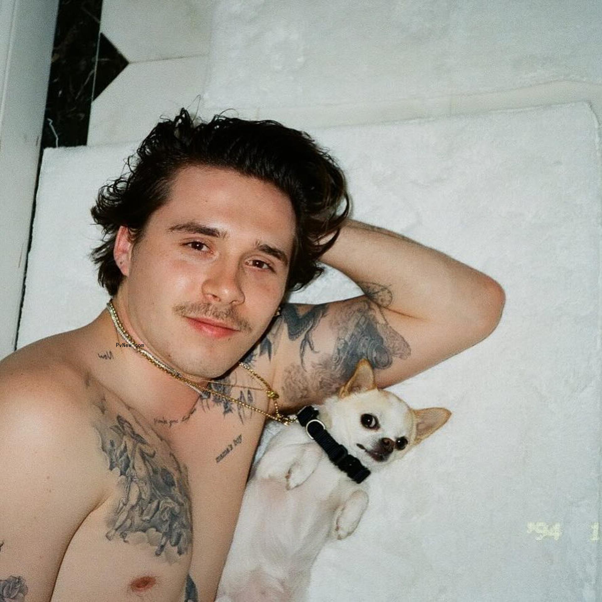 Brooklyn Beckham and his dog Nala