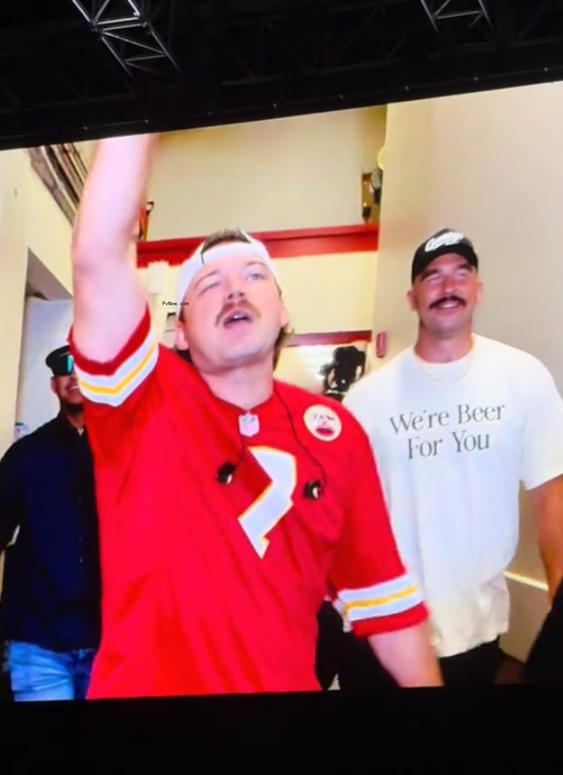 Travis Kelce and Patrick Mahomes at Morgan Wallen's concert.