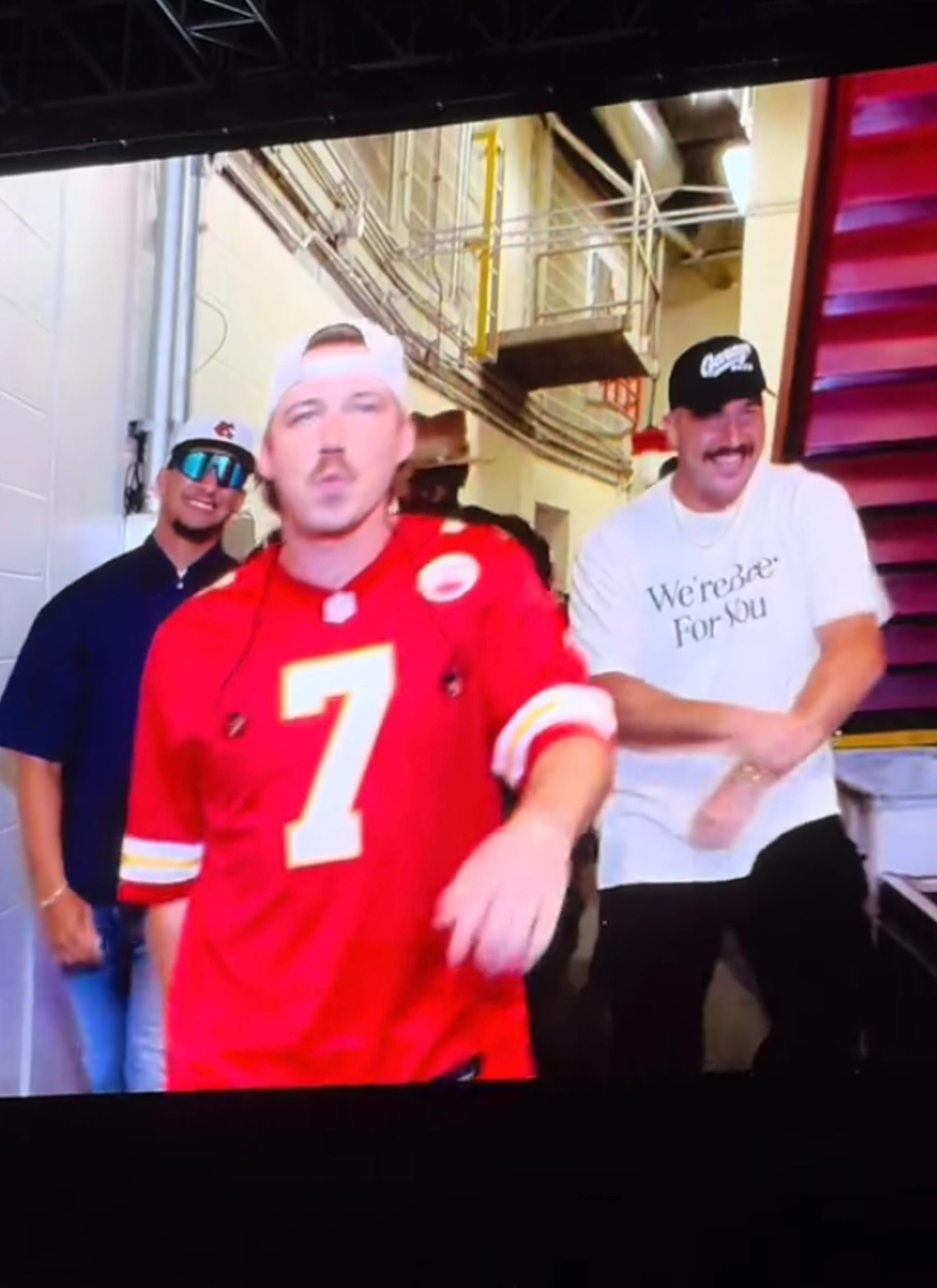 Travis Kelce and Patrick Mahomes at Morgan Wallen's concert.