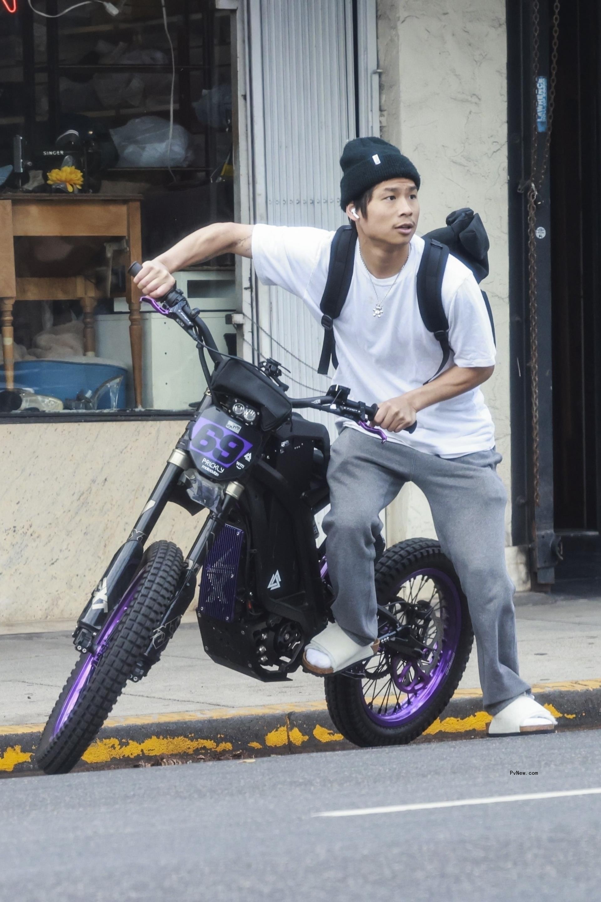 Pax Jolie-Pitt on his bike.