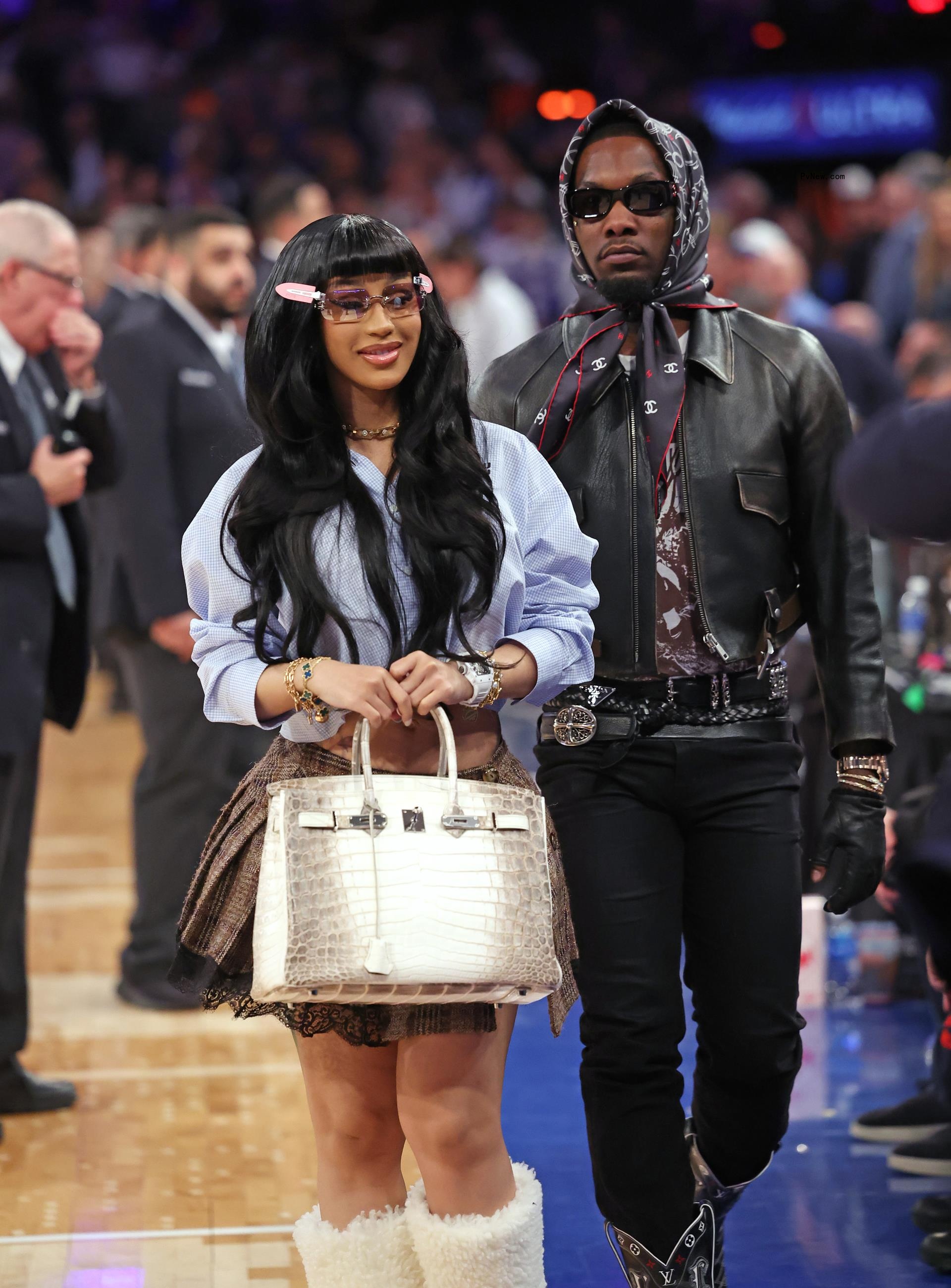 Cardi B and Offset at a basketball game in April 2024