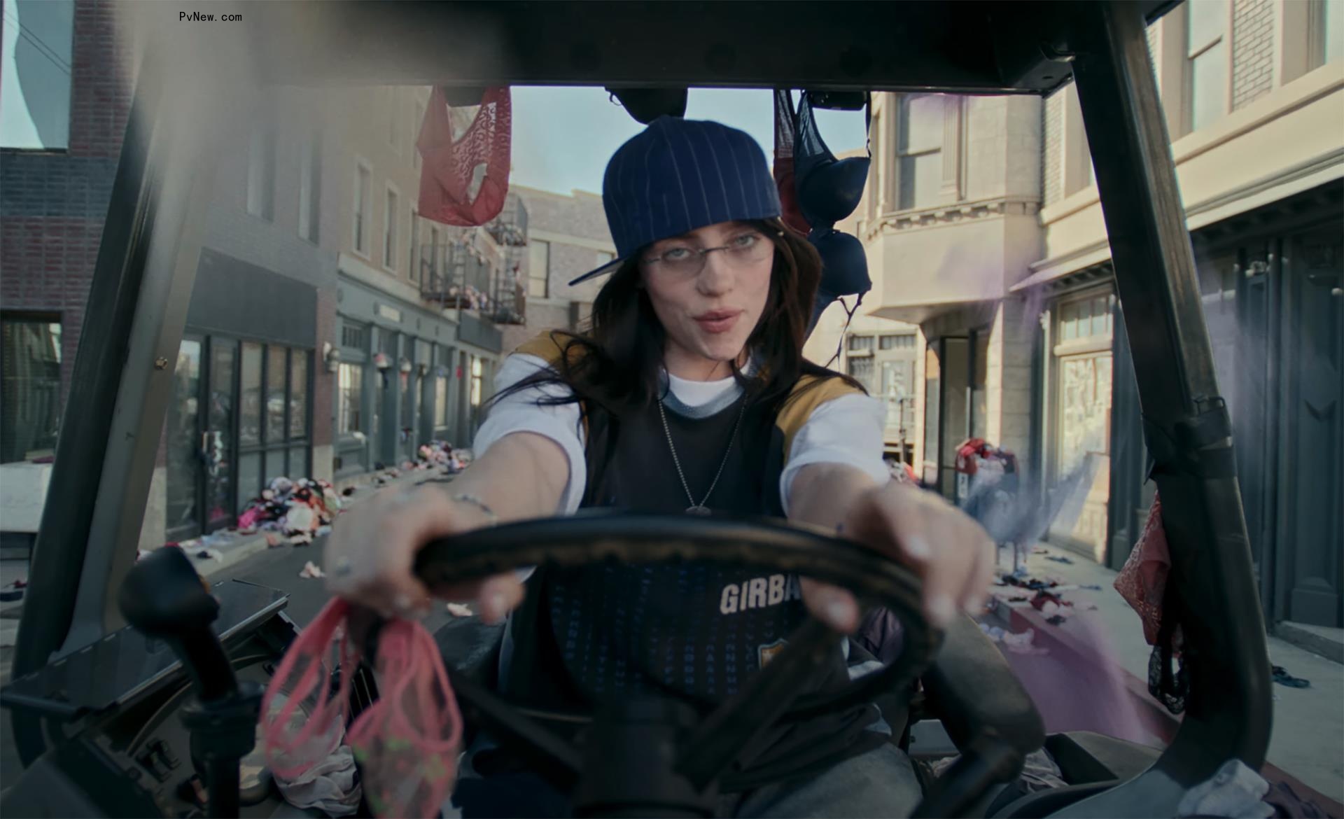 Billie Eilish surrounded by underwear in the ‘Guess’ music video