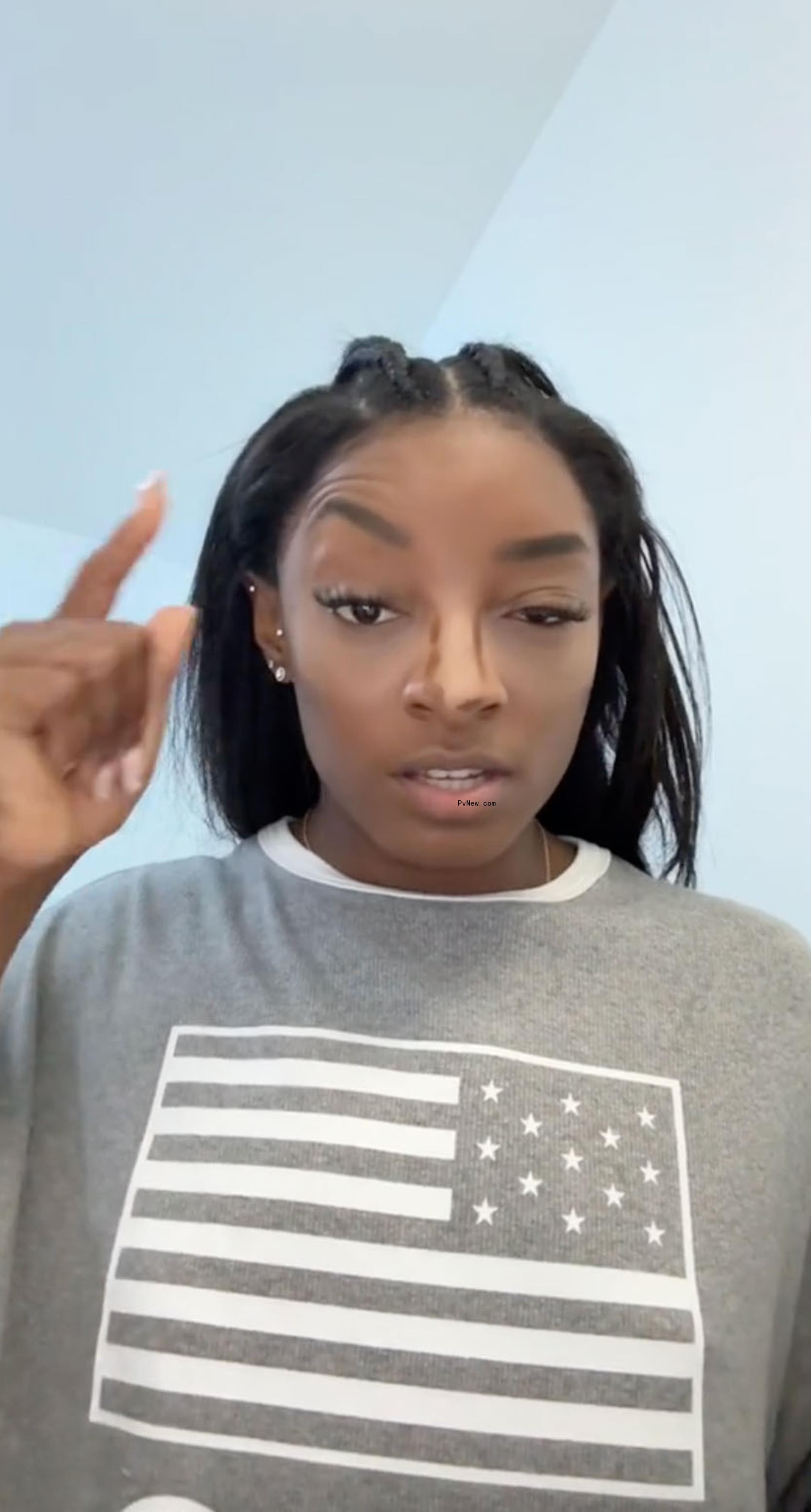 Simone Biles doing her makeup in a TikTok video on Friday, Aug. 2, 2024