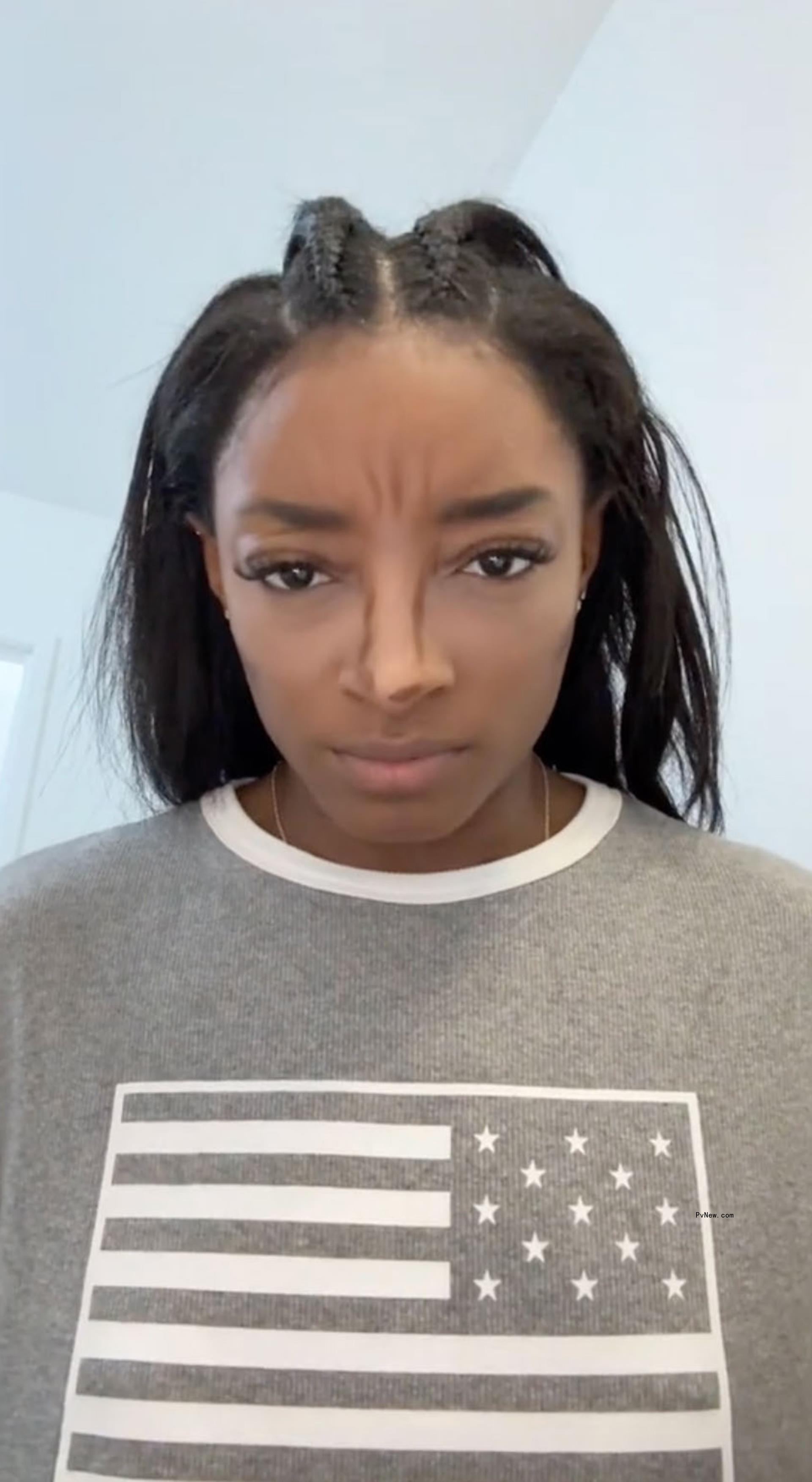 Simone Biles doing her makeup in a TikTok video on Friday, Aug. 2, 2024