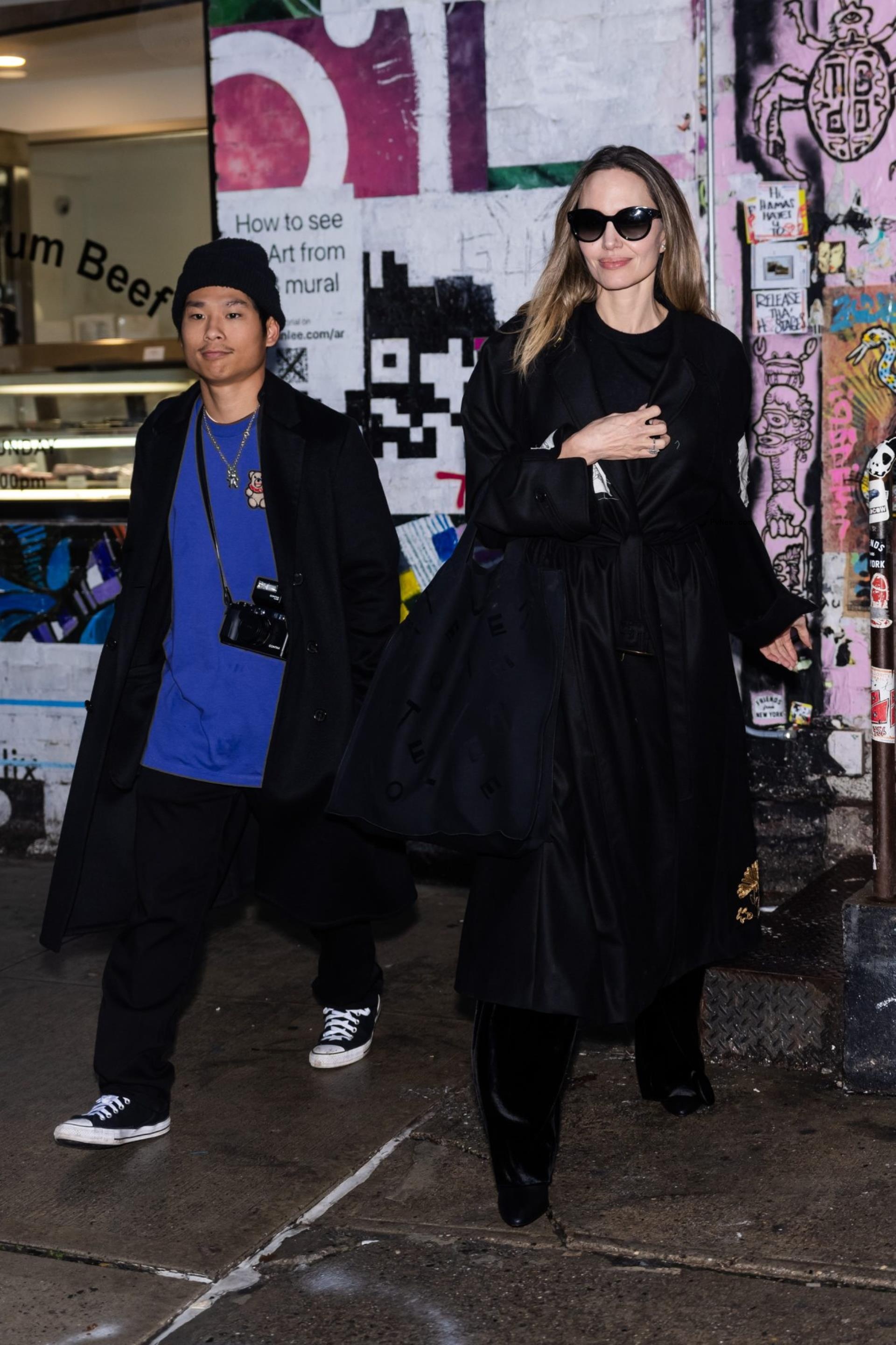 Pax Jolie-Pitt and Angelina Jolie are seen in the East Village.