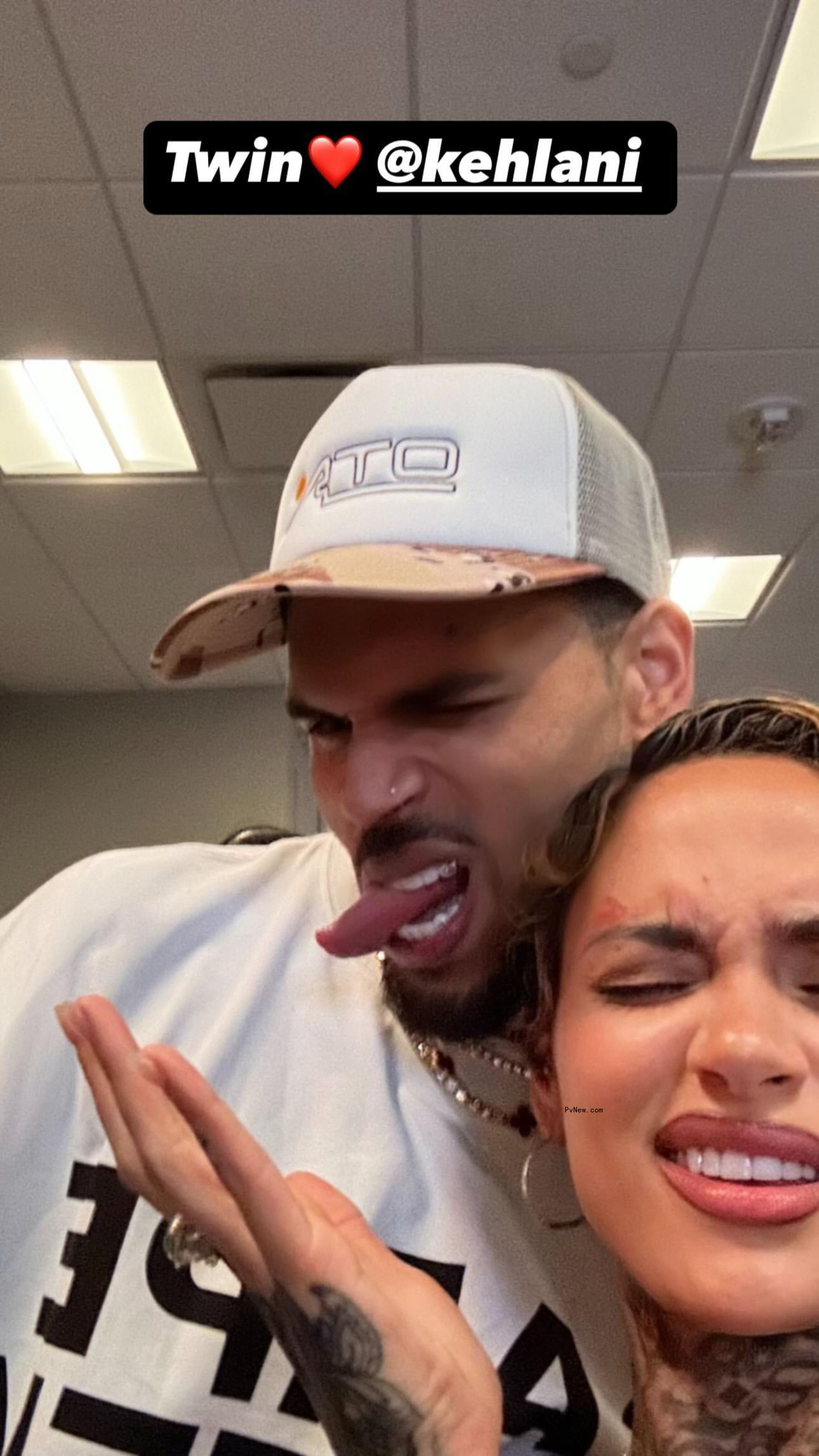 A selfie of Chris Brown and Kehlani.