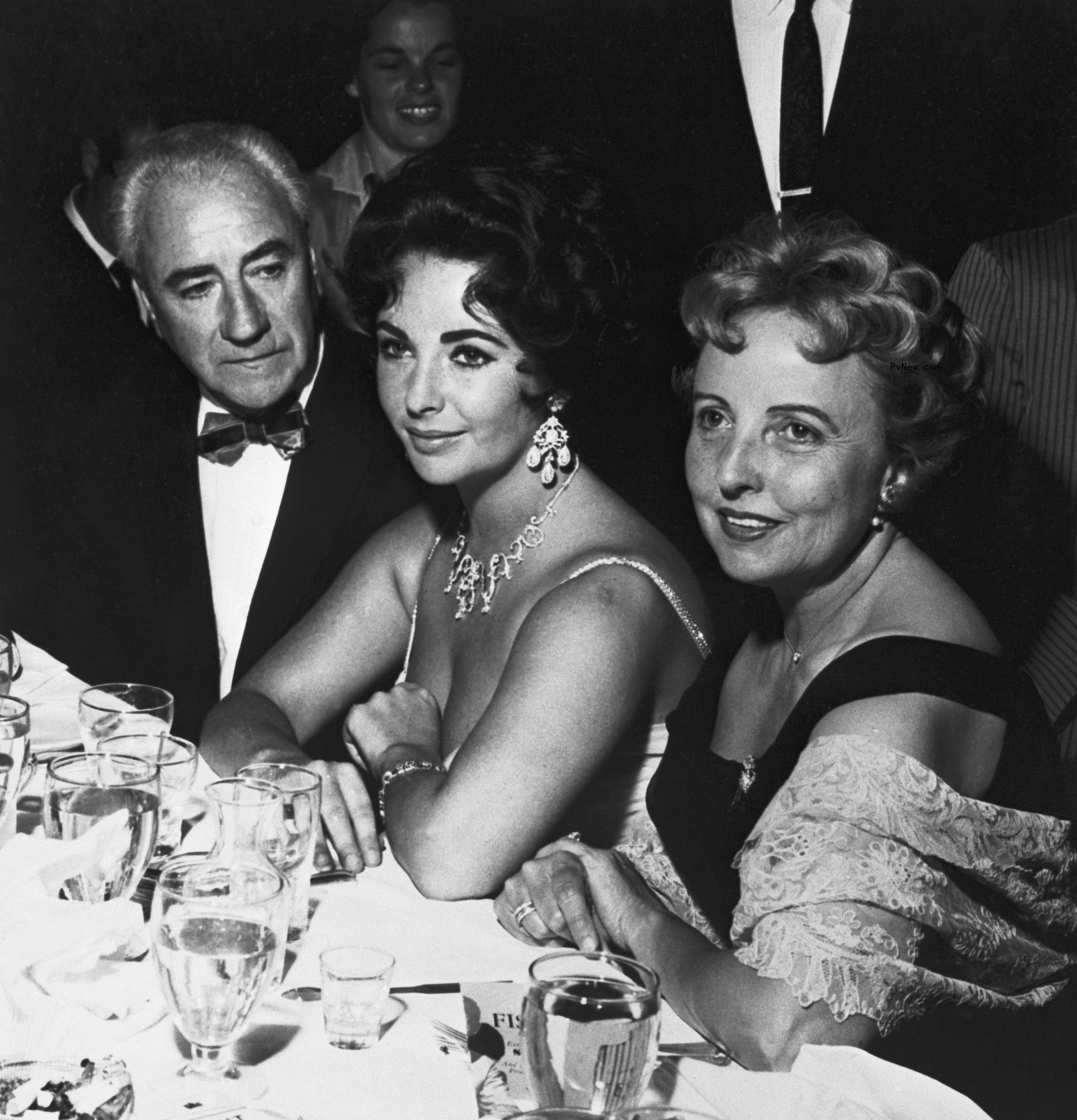 Elizabeth Taylor accompanied by her mother and father watching singer Eddie Fisher perform during his opening night at the Las Vegas Tropicana April 1.