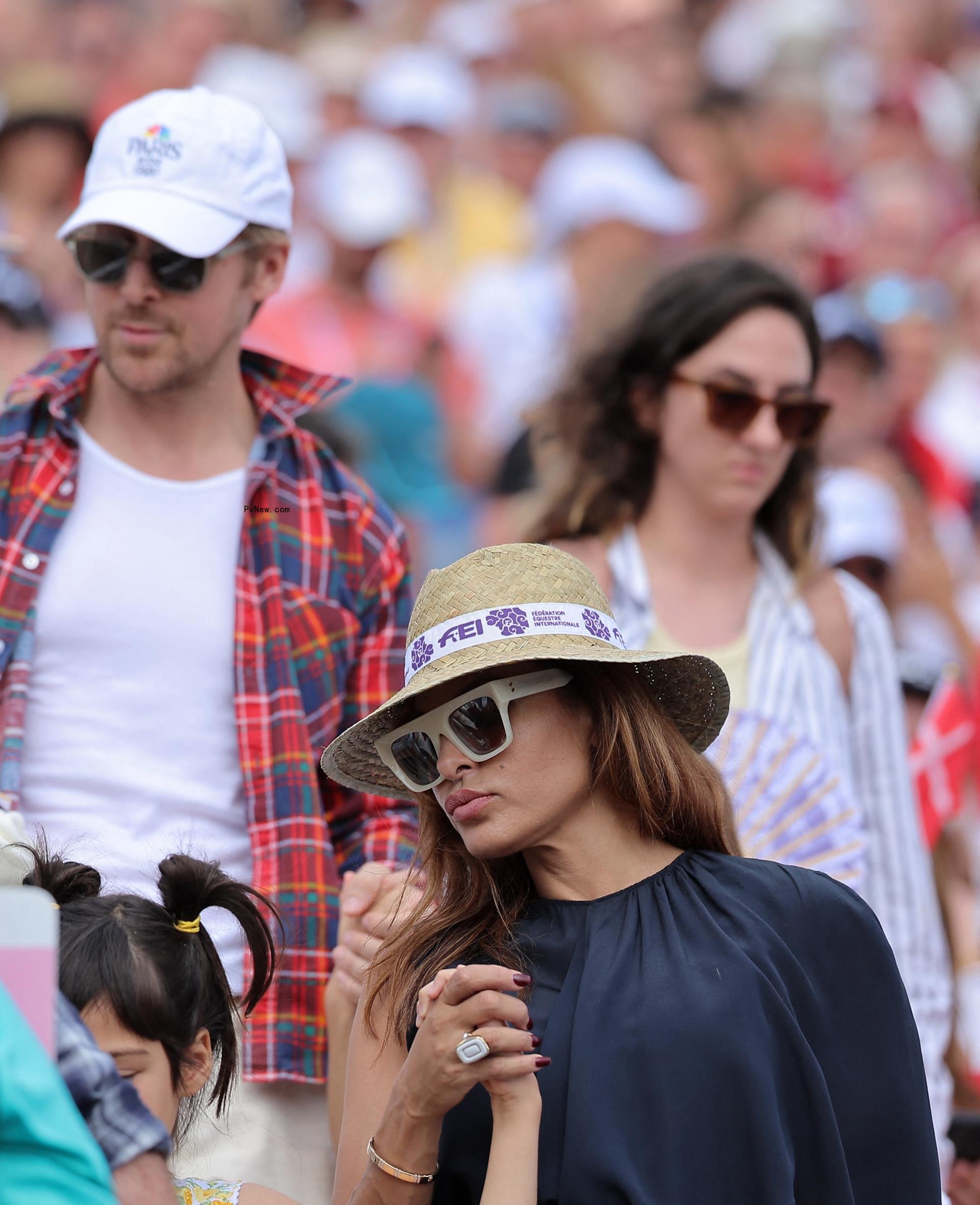 Actor Ryan Gosling and actress Eva Mendes are seen in the stands during the 2024 Paris Olympics.