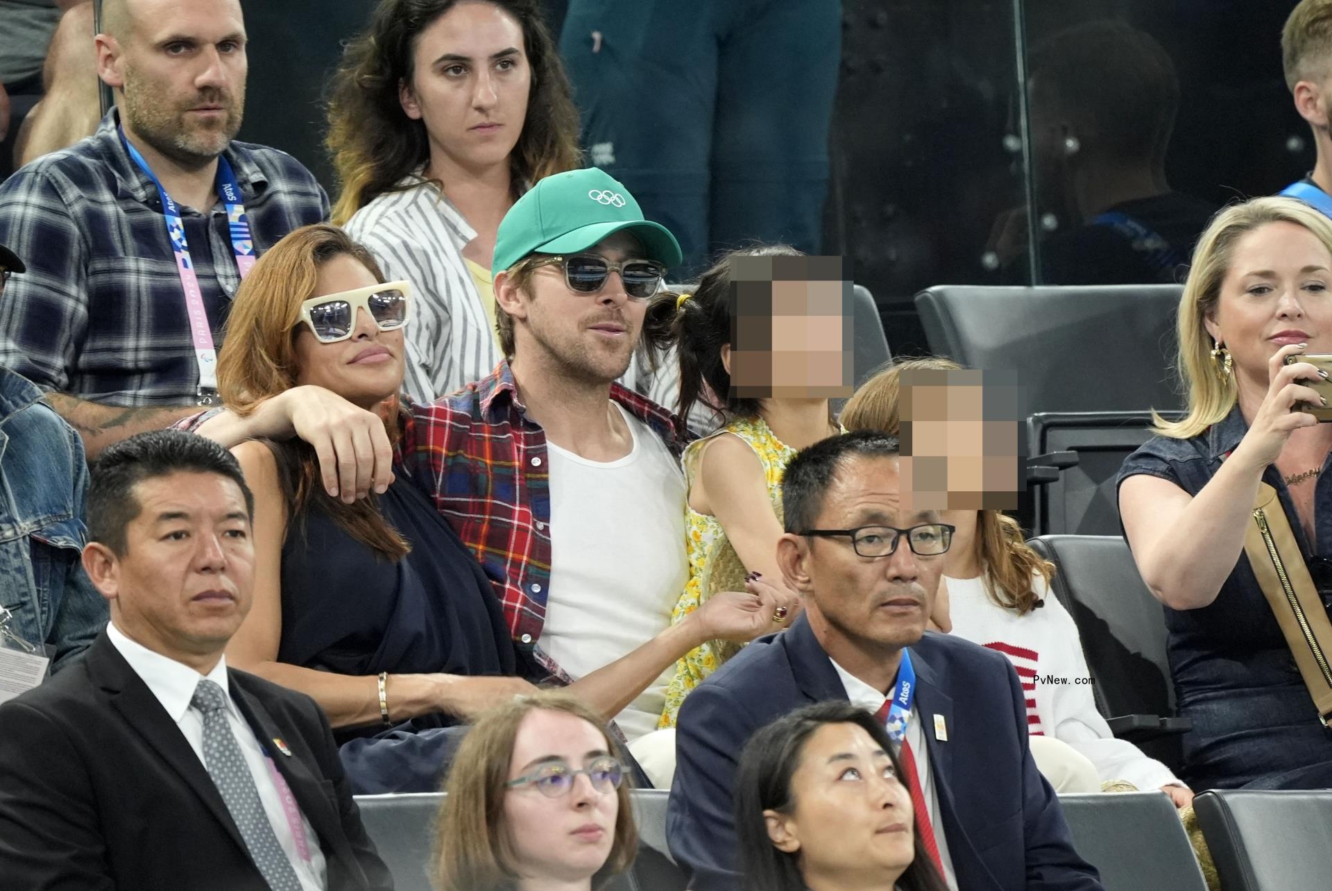 Eva Mendes and Ryan Gosling attends the second day of gymnastics event finals during the Paris 2024 Olympic Summer Games at Bercy Arena.
