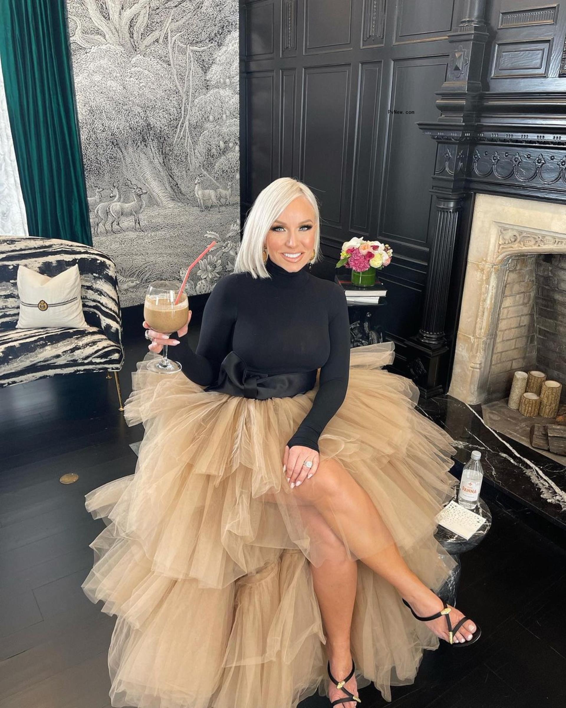 Margaret Josephs sitting and posing for a photo