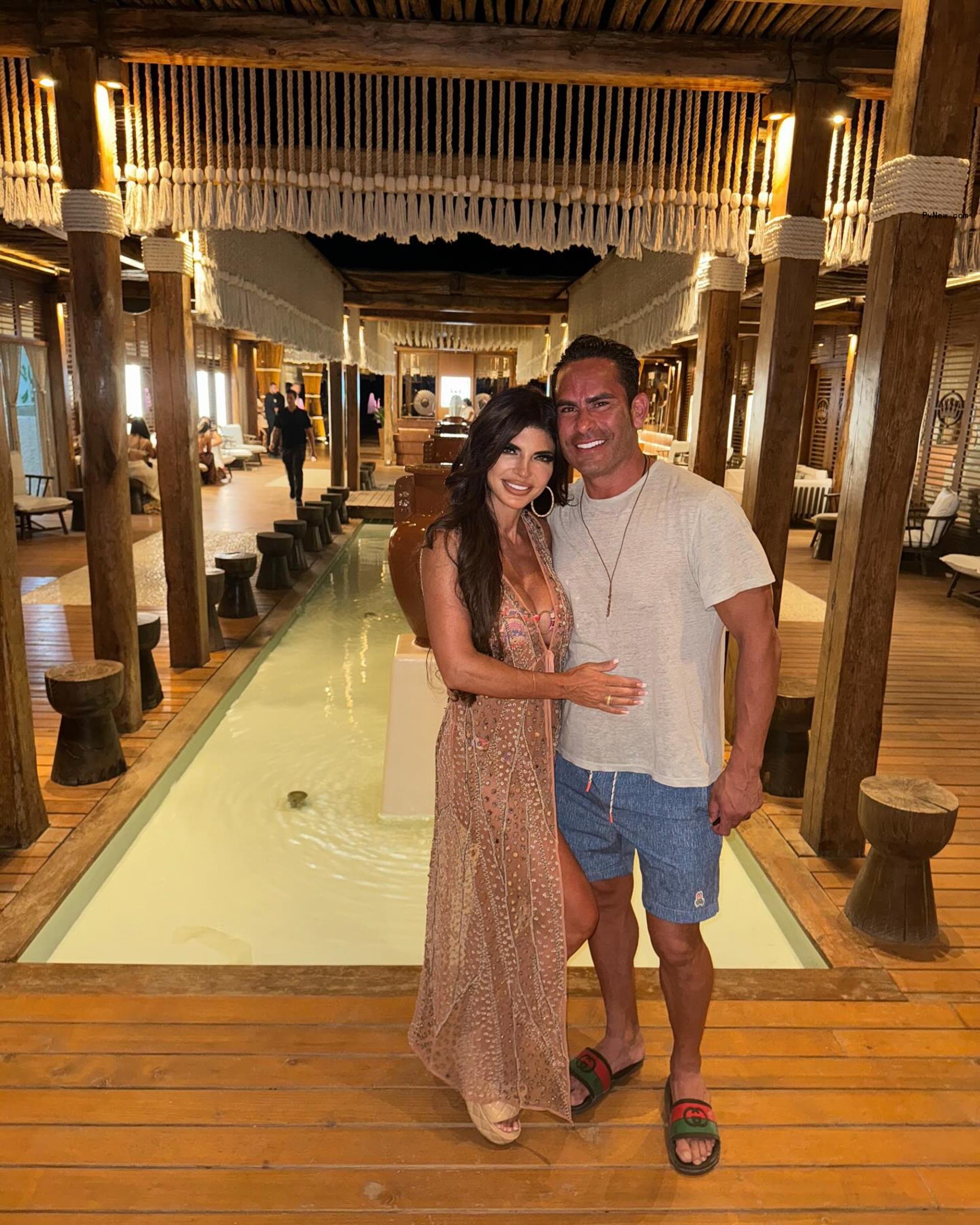Luis Ruelas and Teresa Giudice posing together