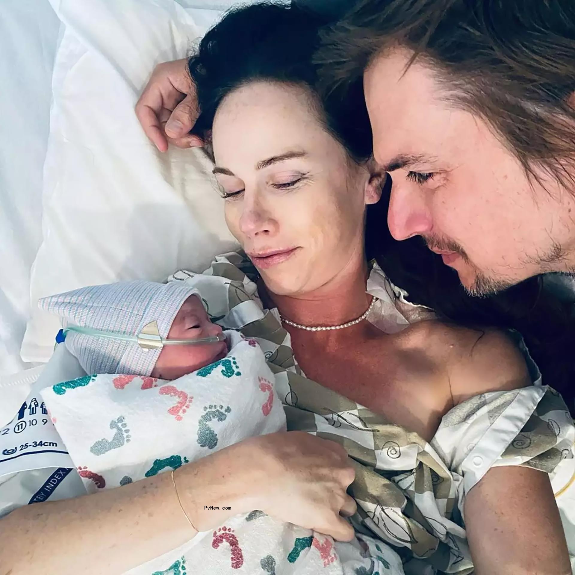 Barbara Bush and Craig Coyne with their newborn daughter Cora