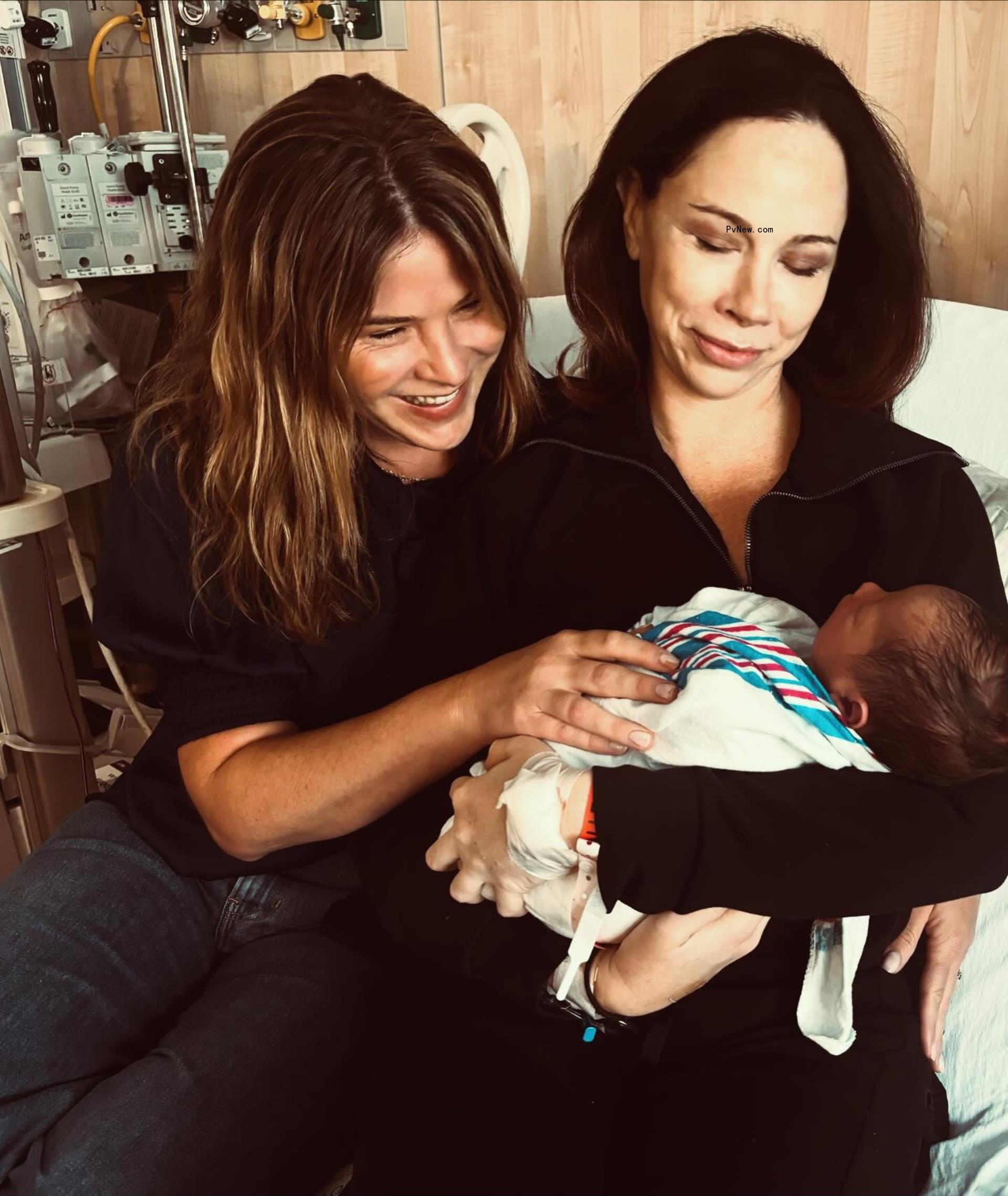 Jenna Bush Hager and Barbara Bush sitting with Barbara Bush's baby