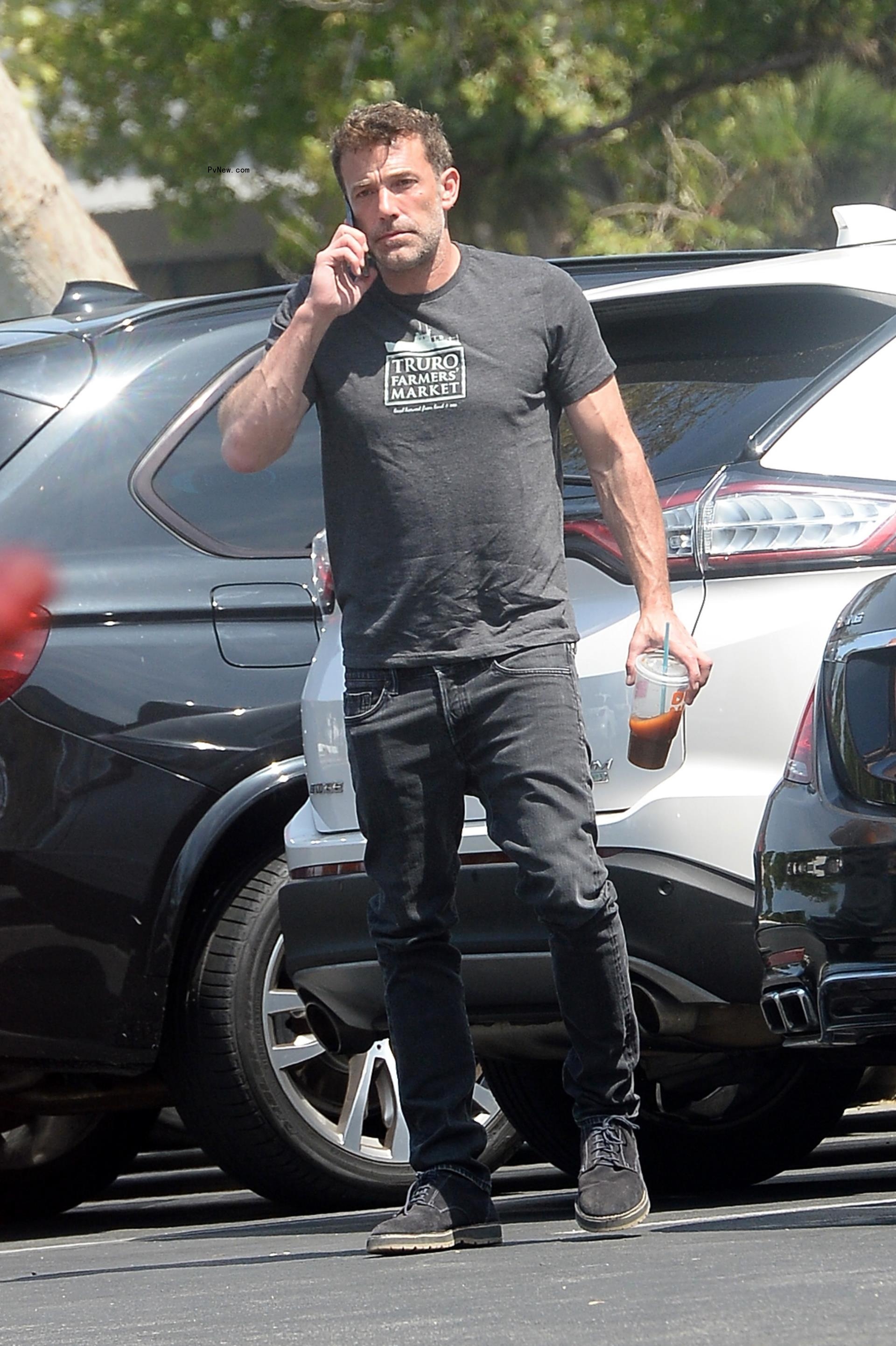 Ben Affleck talks on phone in Los Angeles parking lot on Friday.