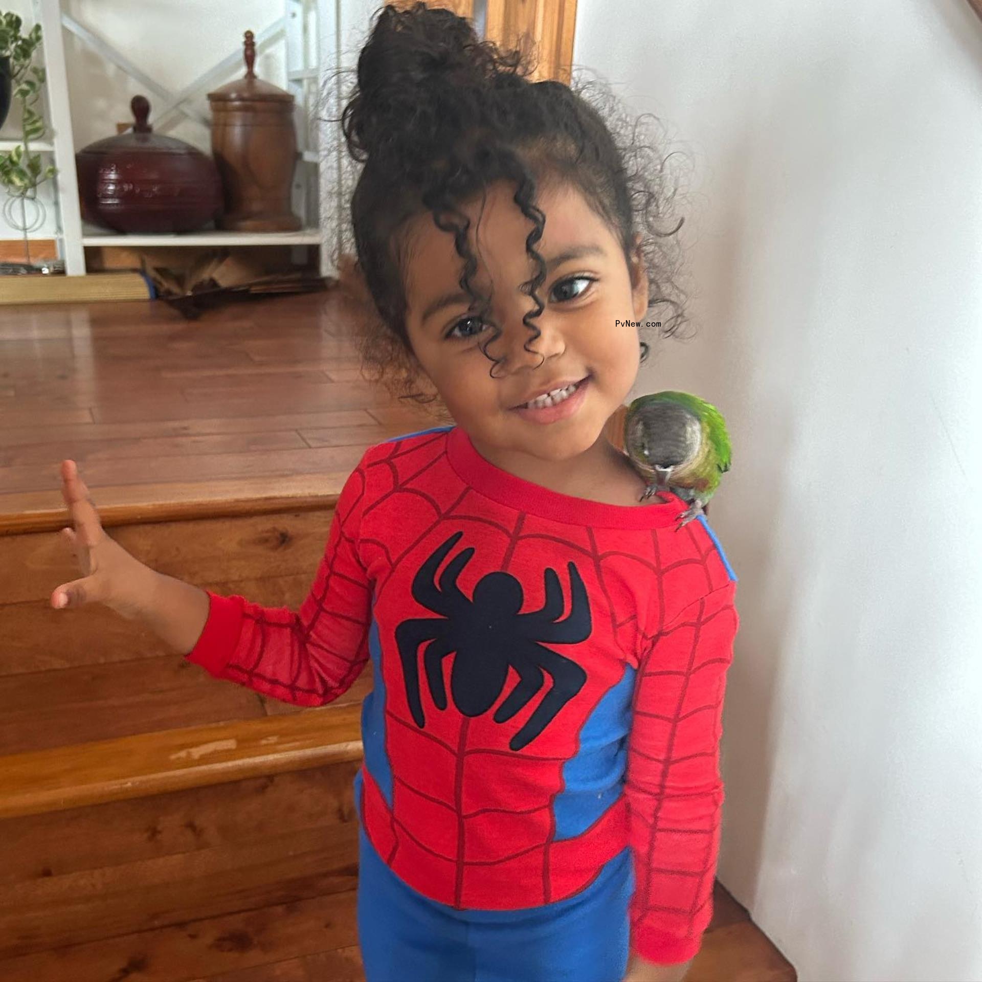 Adeya in a spider-man shirt.