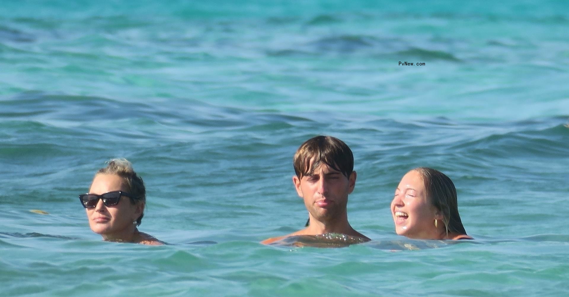Kate Moss, Lila Moss, Yoni Helbitz in the water