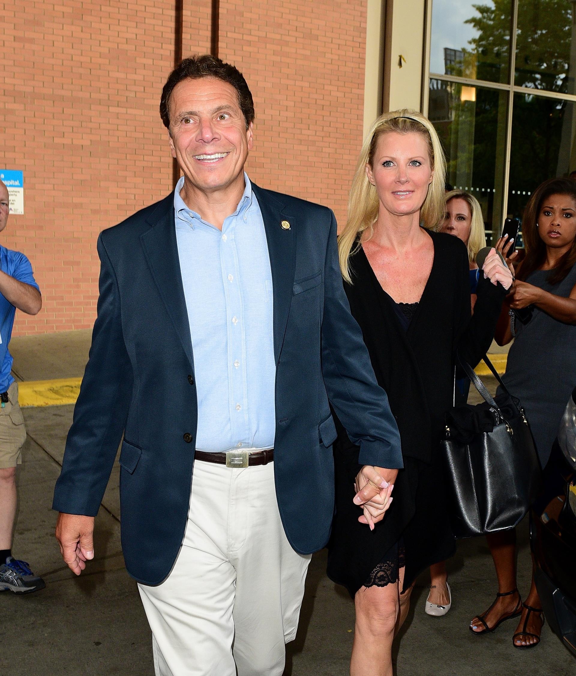 Governor Andrew Cuomo and Sandra Lee leave Mount Sinai Roosevelt Hospital on August 12, 2015.