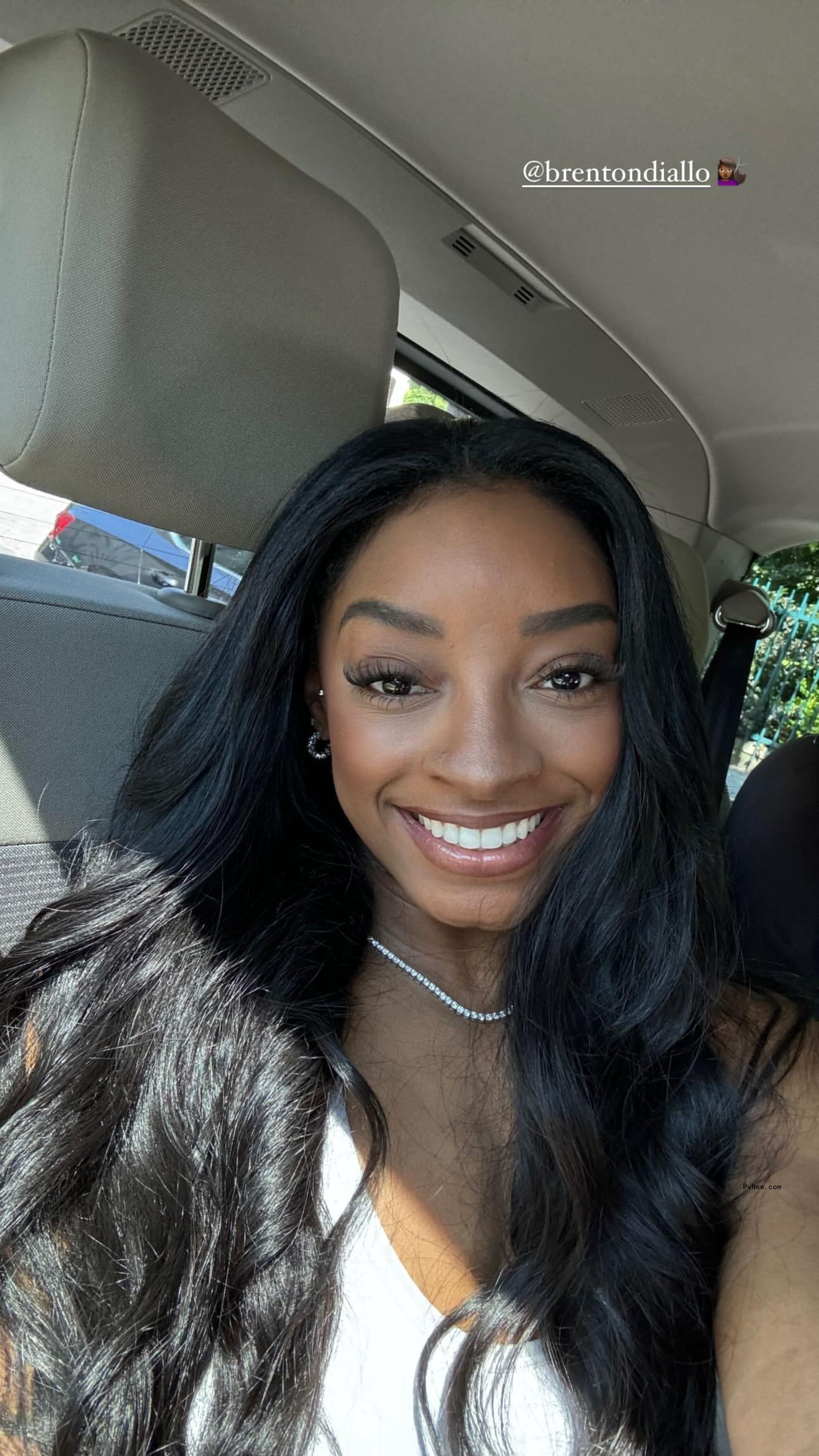 A car selfie of Simone Biles.