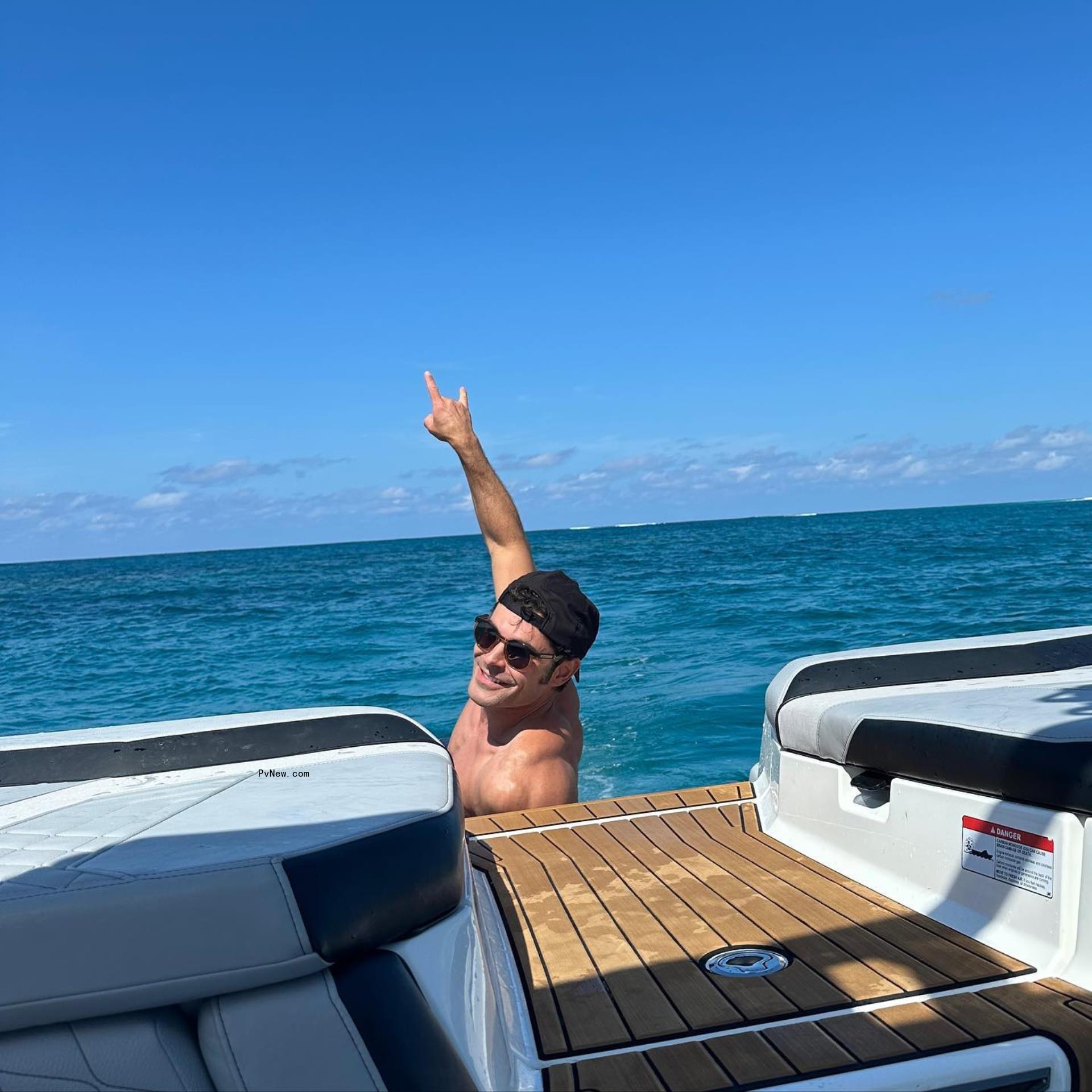 Zac Efron swimming.
