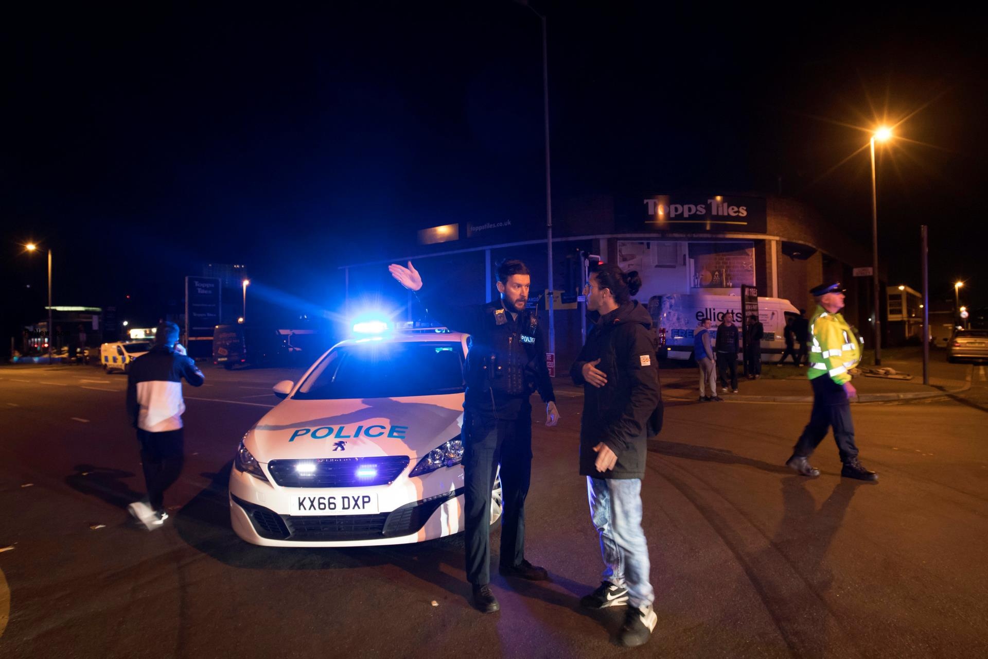Police set up a cordon outside the Manchester Arena in northern England.