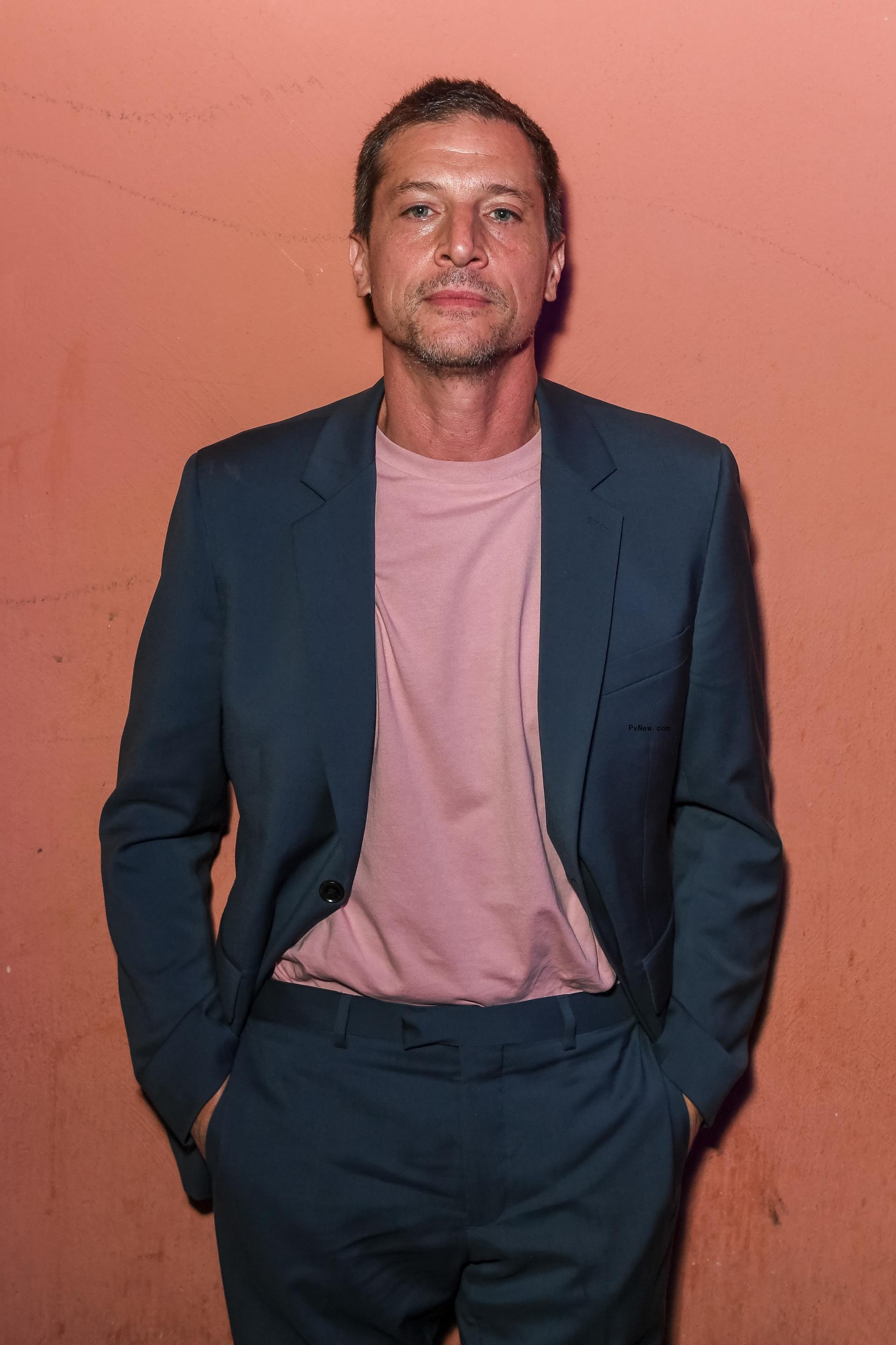 Simon Rex posing for a photo