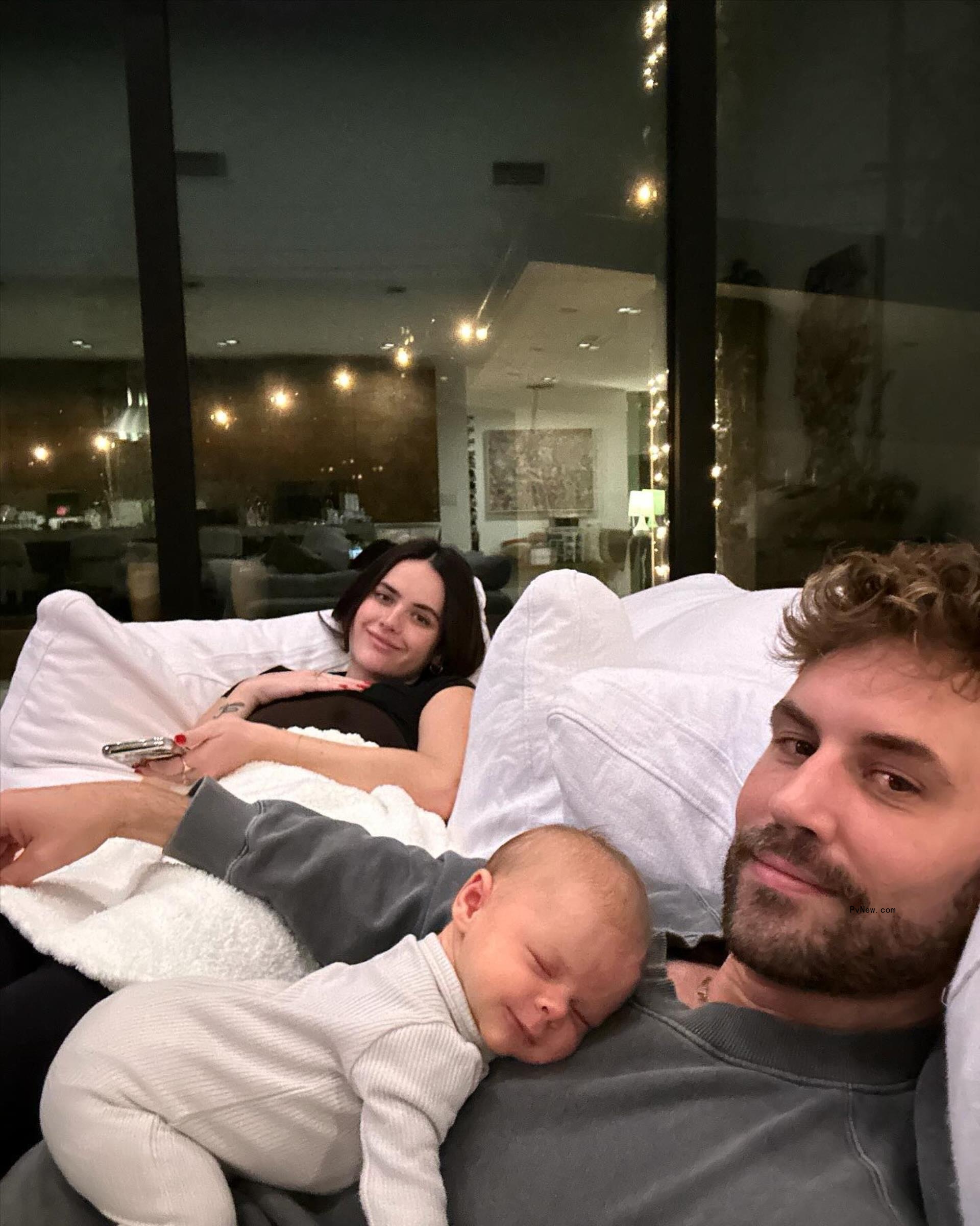 A selfie of Natalie Joy, Nick Viall and their baby