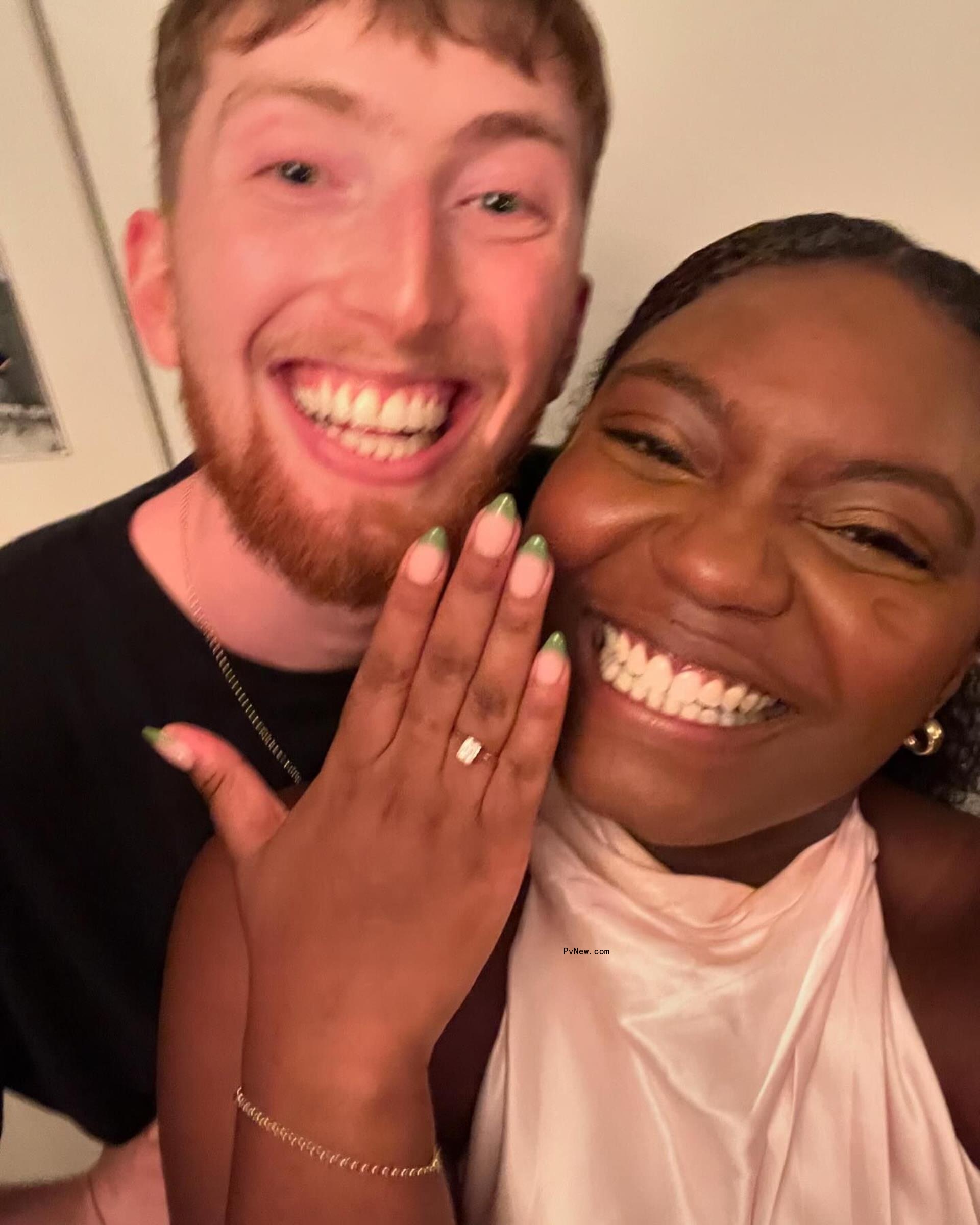 selfie of julianne moore's son caleb and his new fiancee showing her ring