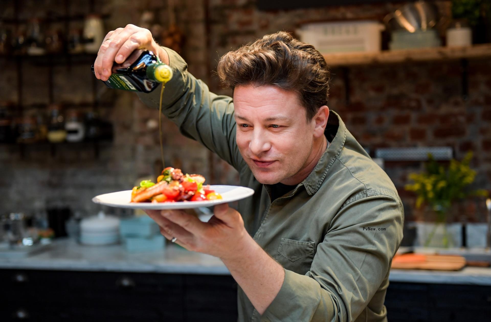 Jamie Oliver cooking in December 2017