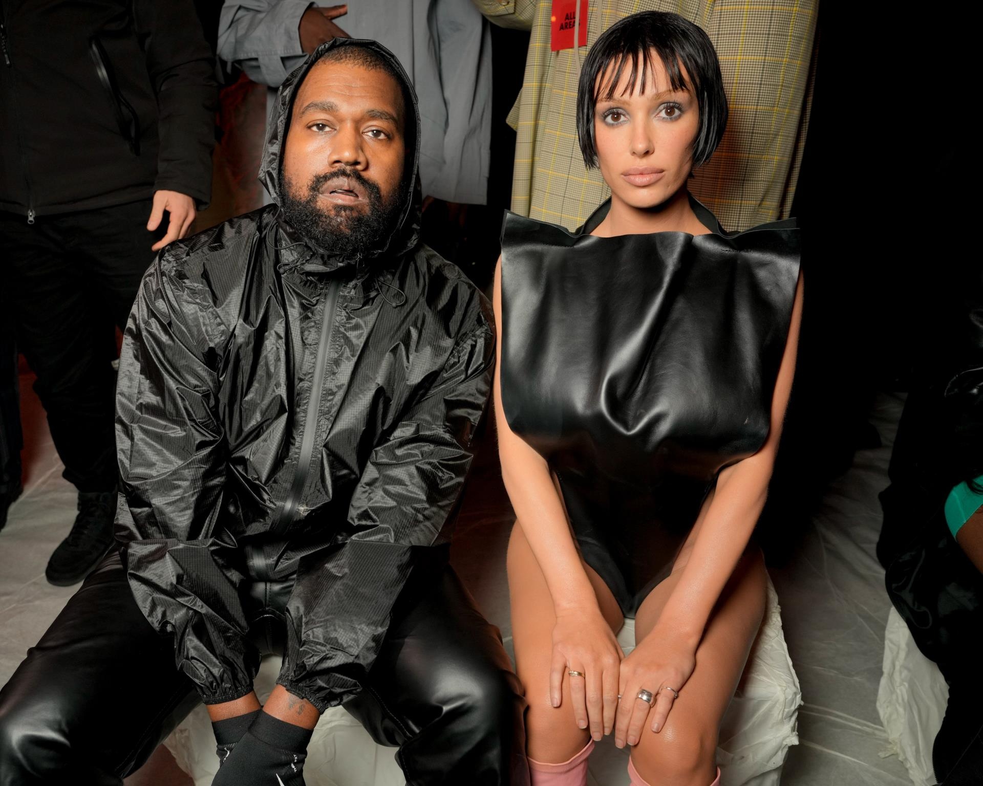 Kanye West and Bianca Censori sitting together