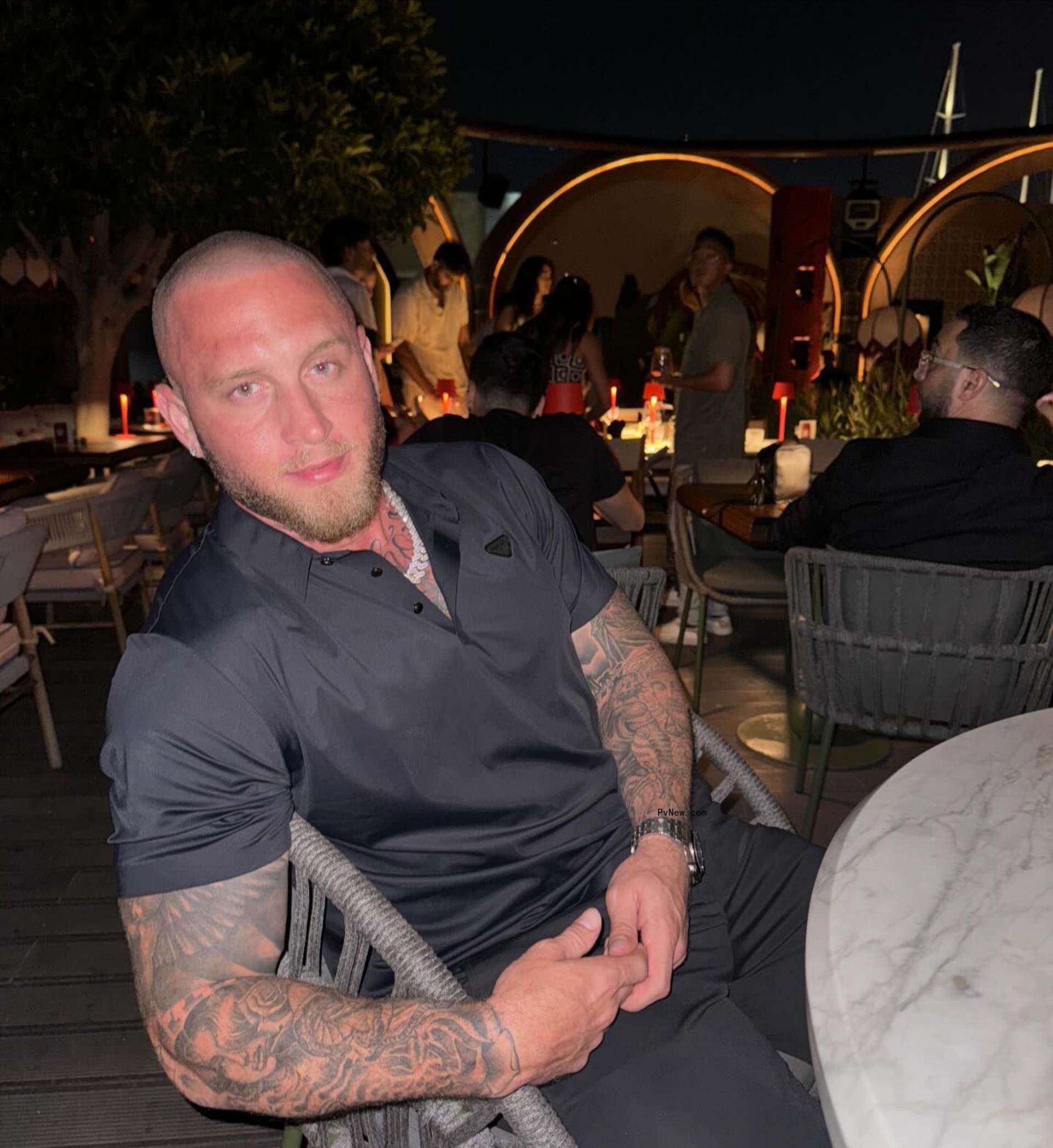 chet hanks lounging in a restaurant