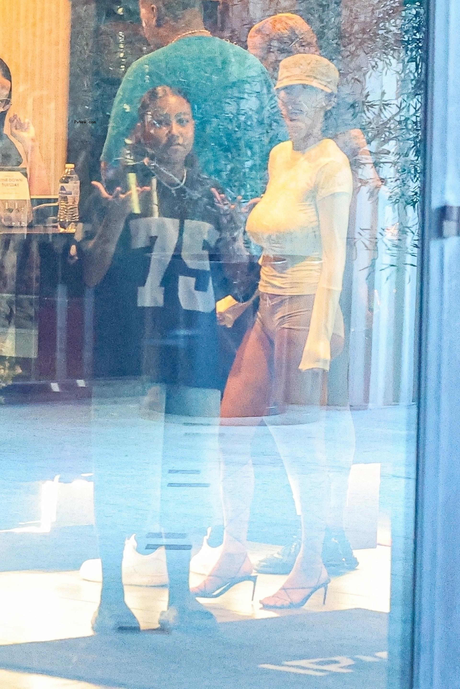 Bianca Censori and North West at a movie theater in Los Angeles