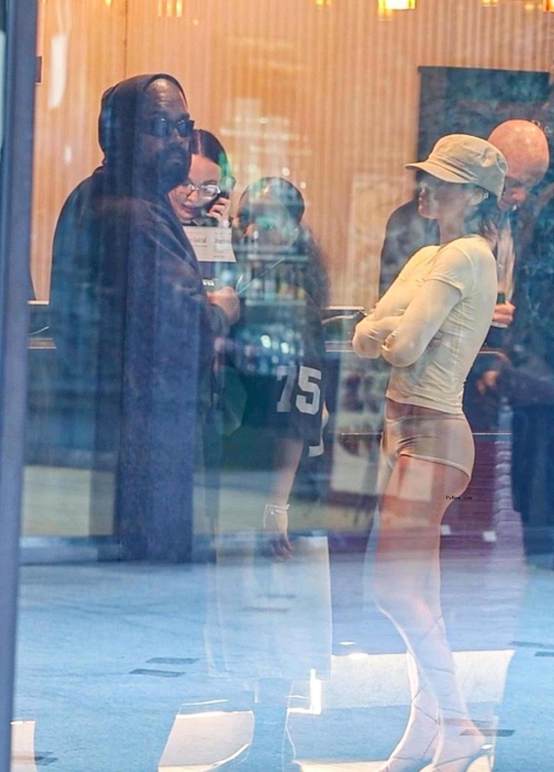 Rapper Kanye West, wife Bianca Censori and daughter North West watch