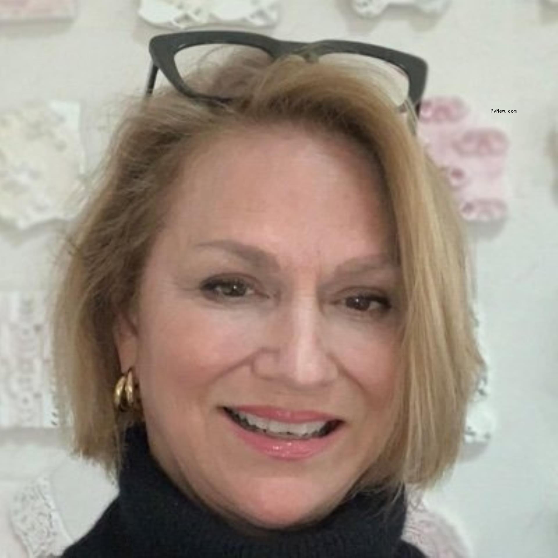 Grimes' mom Sandy Garossino smiling in a social media photo