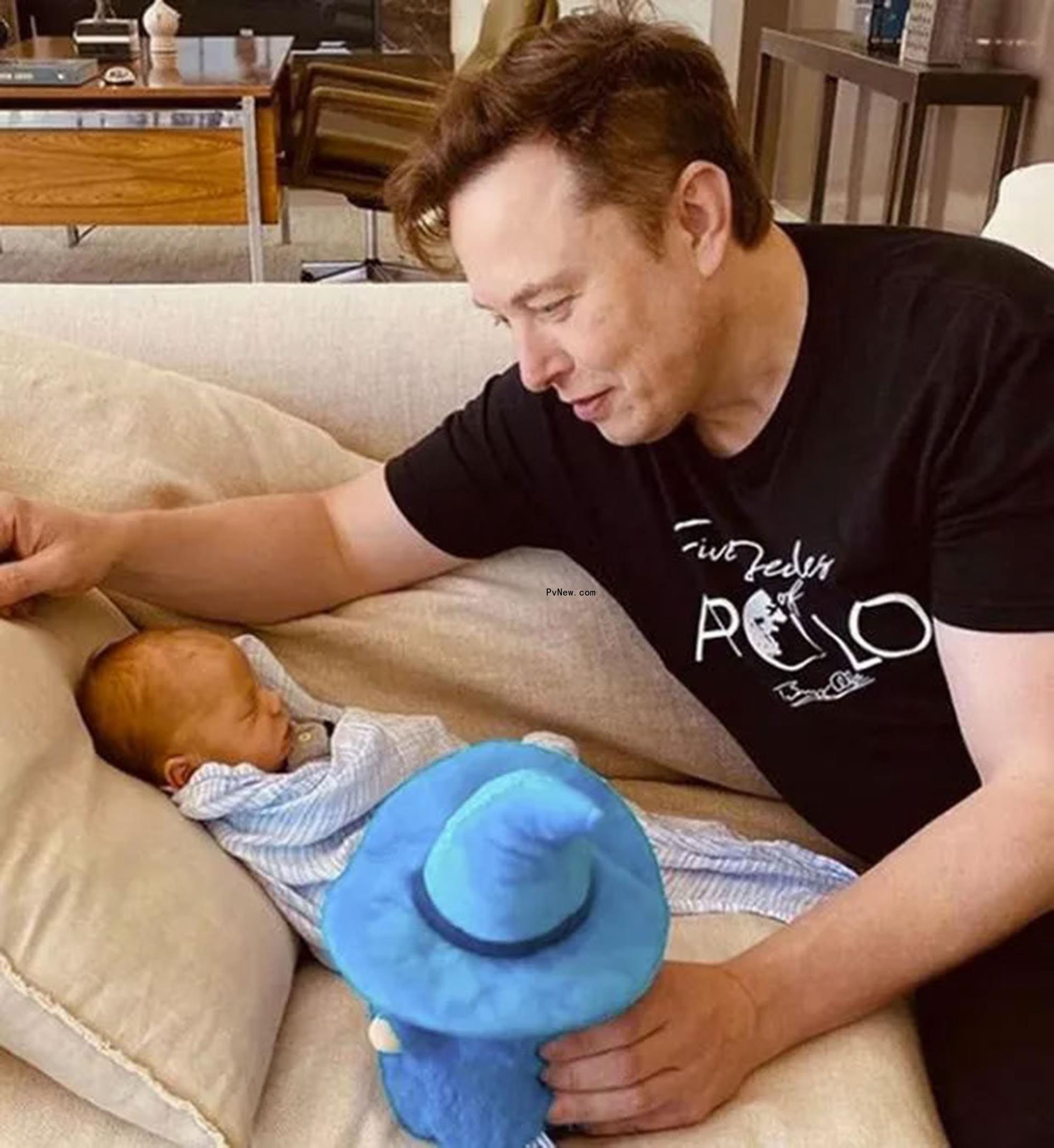 Elon Musk with his child