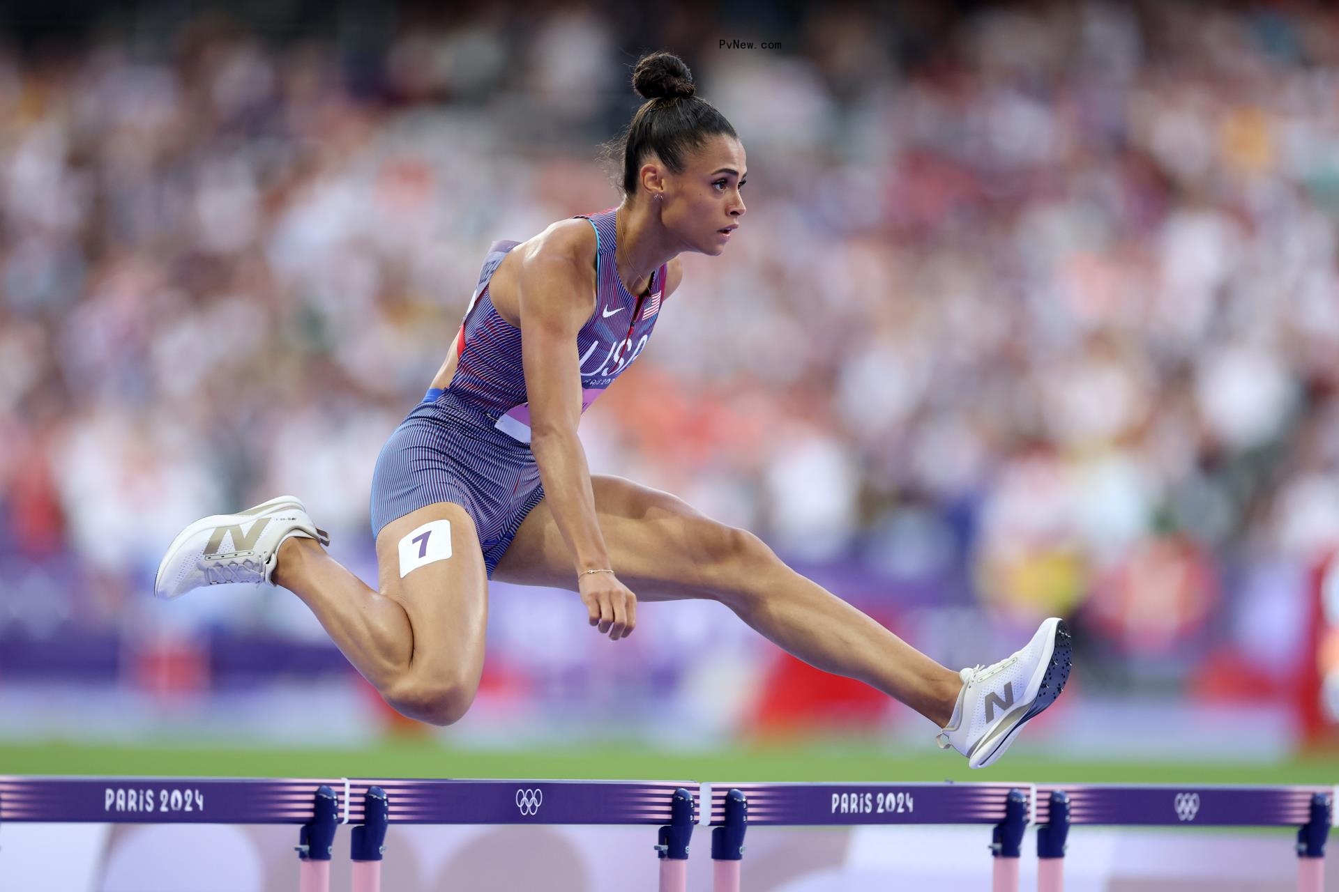 Sydney McLaughlin doing hurdles.