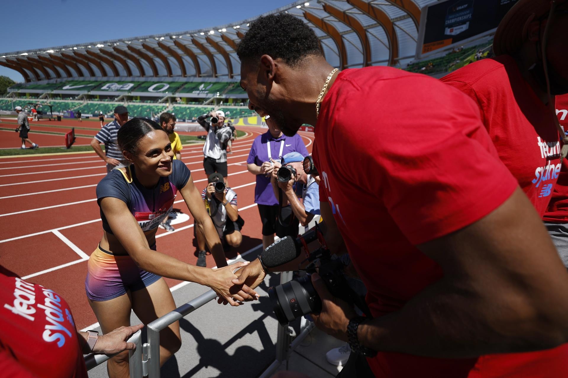 Sydney McLaughlin and Andre Levrone