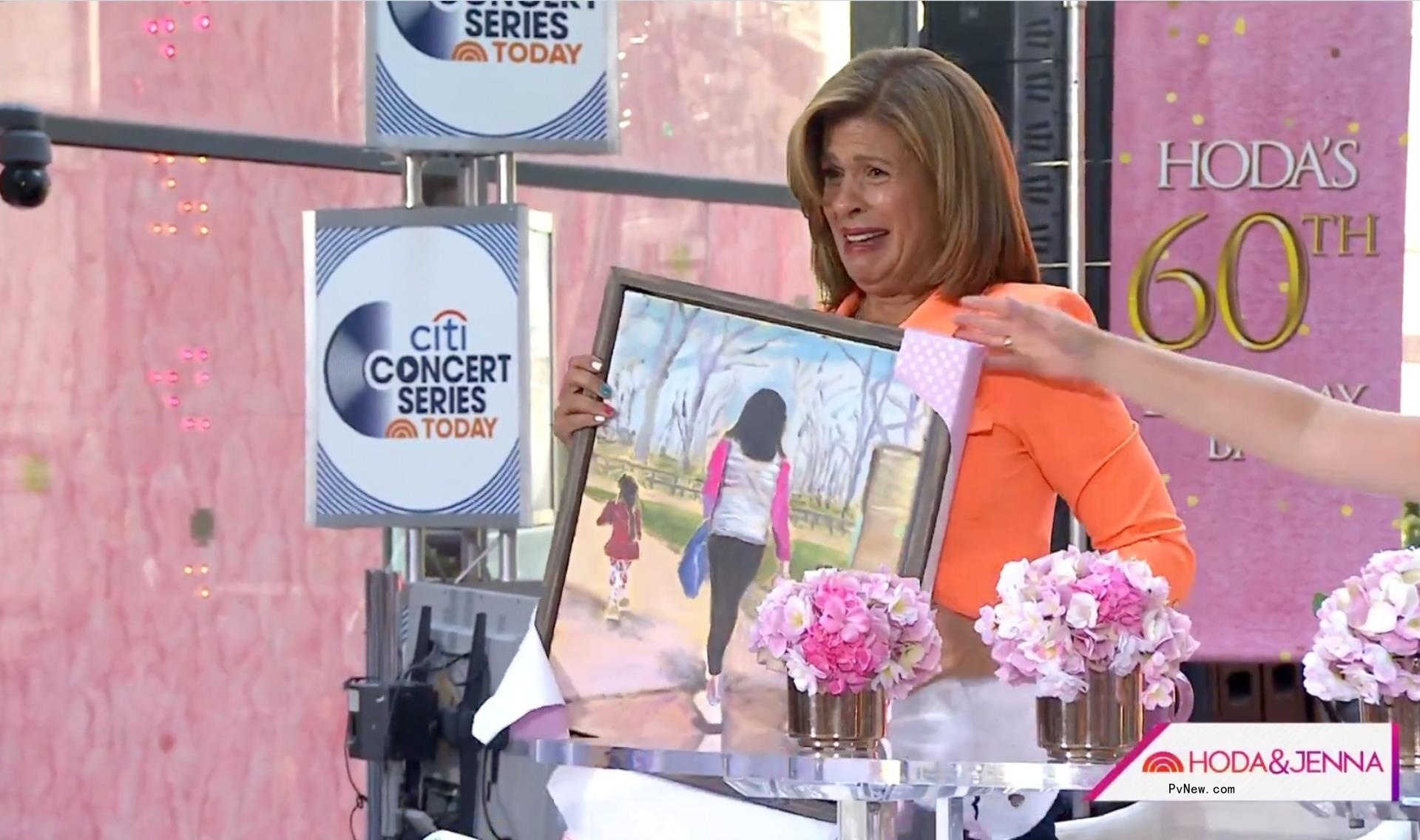 Hoda Kotb opens a portrait gifted to her by Jenna Bush Hager on Monday's episode of the 