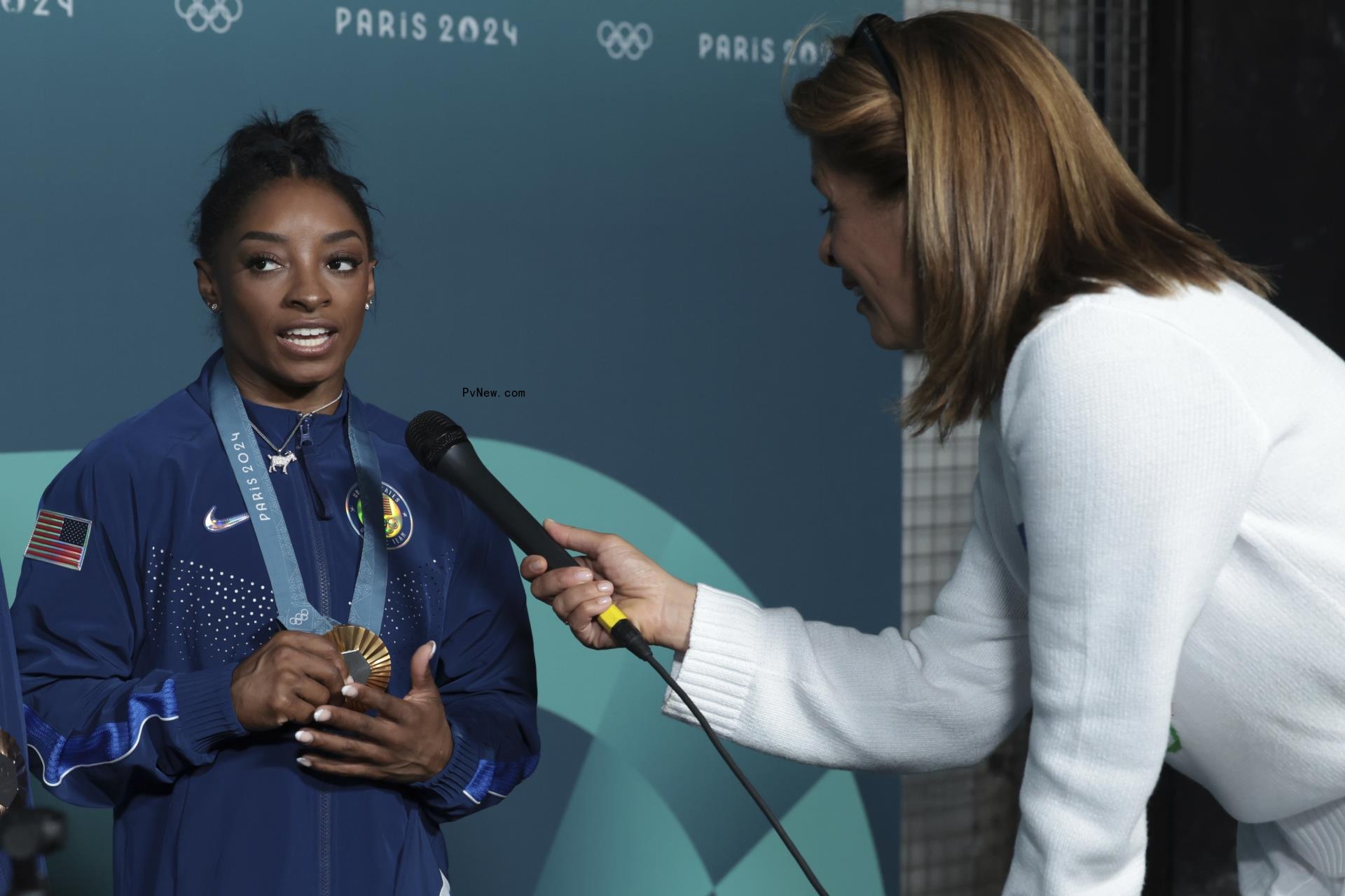 A photo of Simone Biles and Hoda Kotb