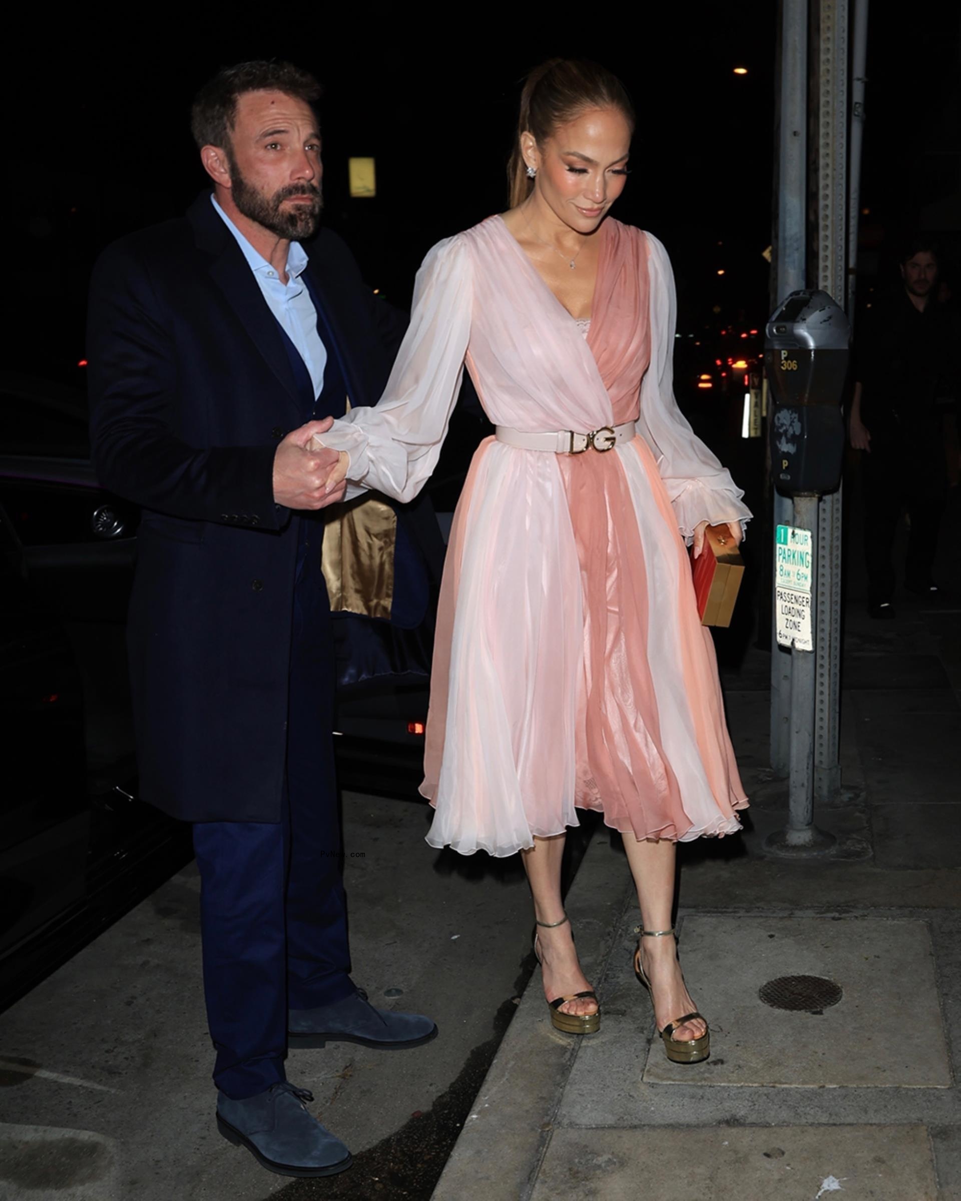 Ben Affleck with Jennifer Lopez wearing a pink Dolce & Gabbana dress on Valentine's Day 2023